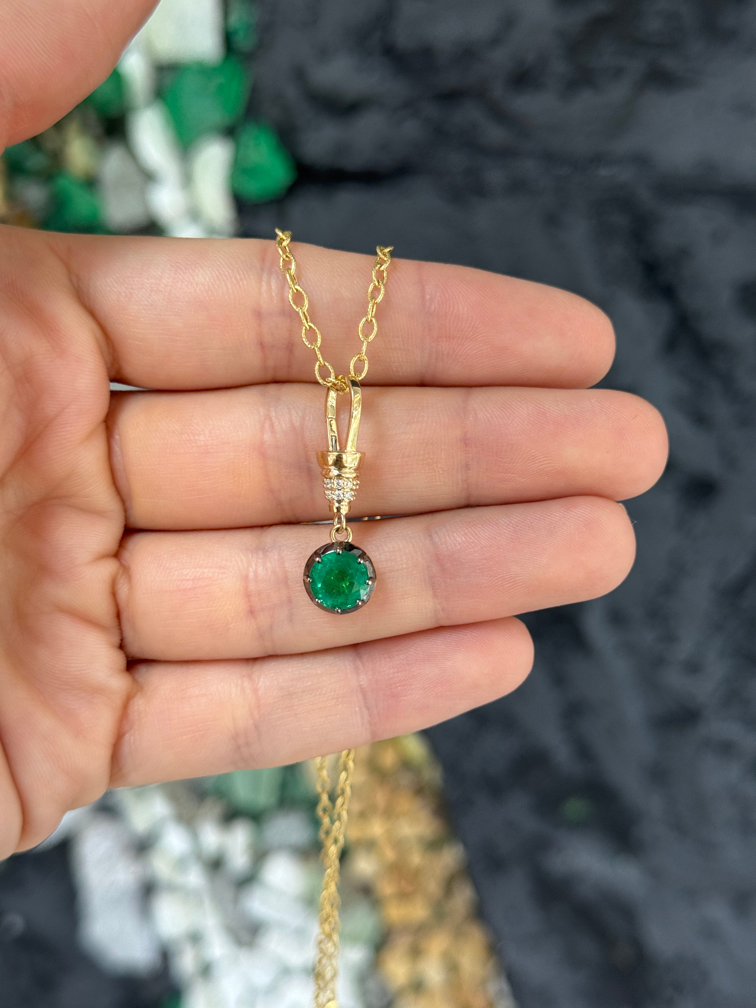 14K gold emerald pendant necklace with round cut gemstone, multi-prong setting, and diamond accents by JR Colombian Emeralds.