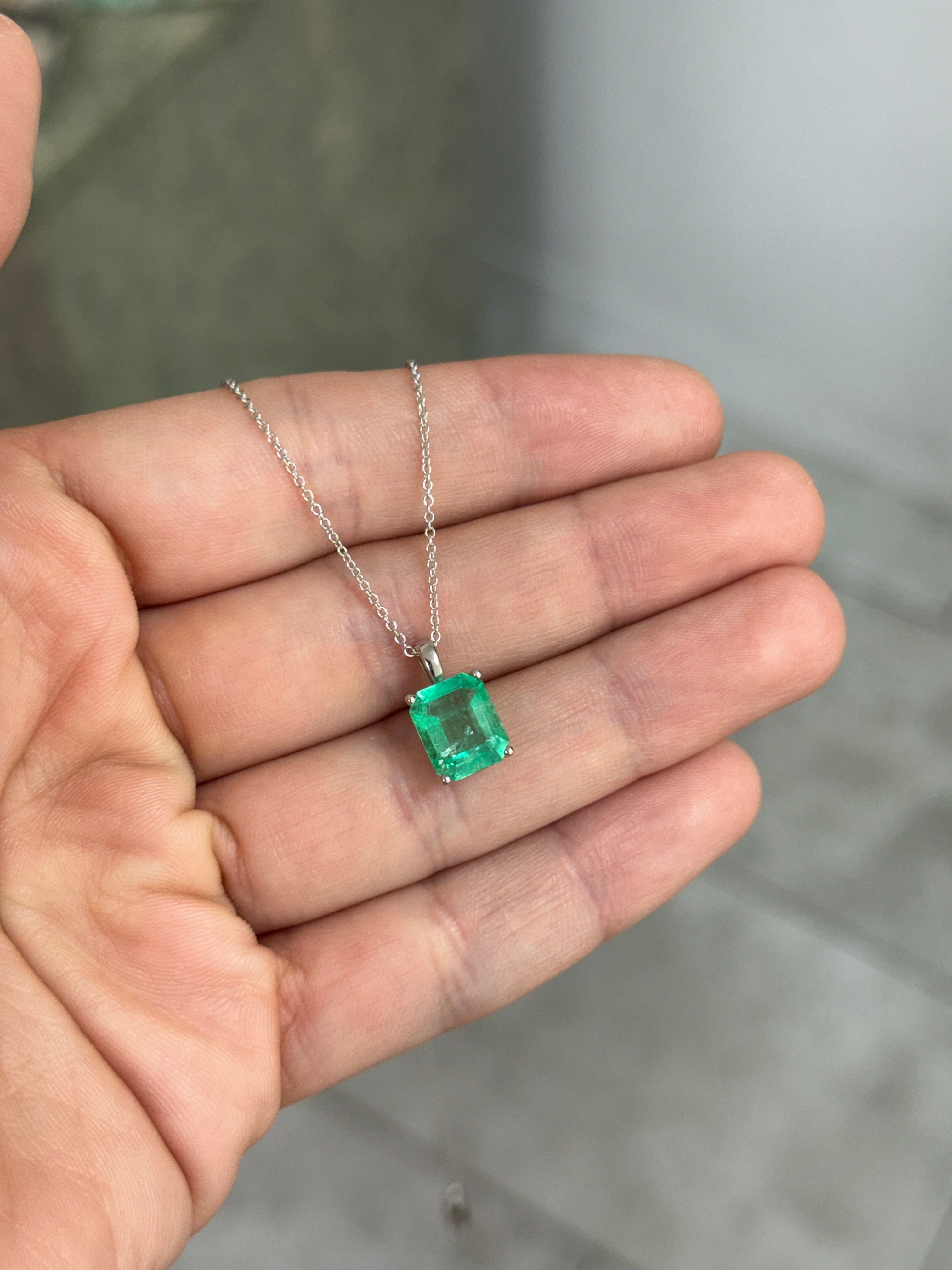 14K white gold Colombian emerald solitaire necklace featuring a 2.51 carat emerald gemstone from JR Colombian Emeralds.