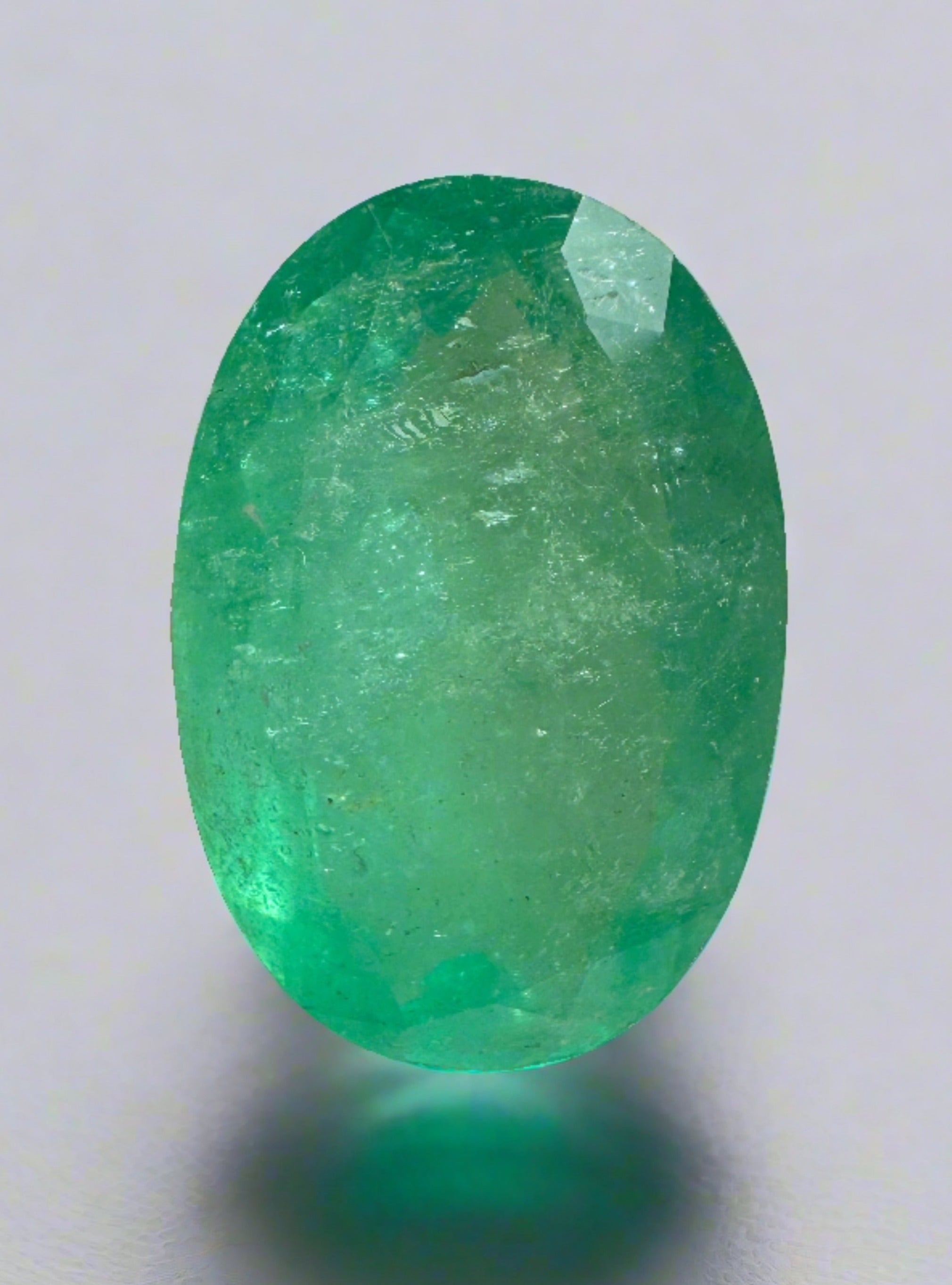 15.65 Carat 21x14 Earthy Green Natural Loose Colombian Emerald-Oval Cut - JR Colombian Emeralds