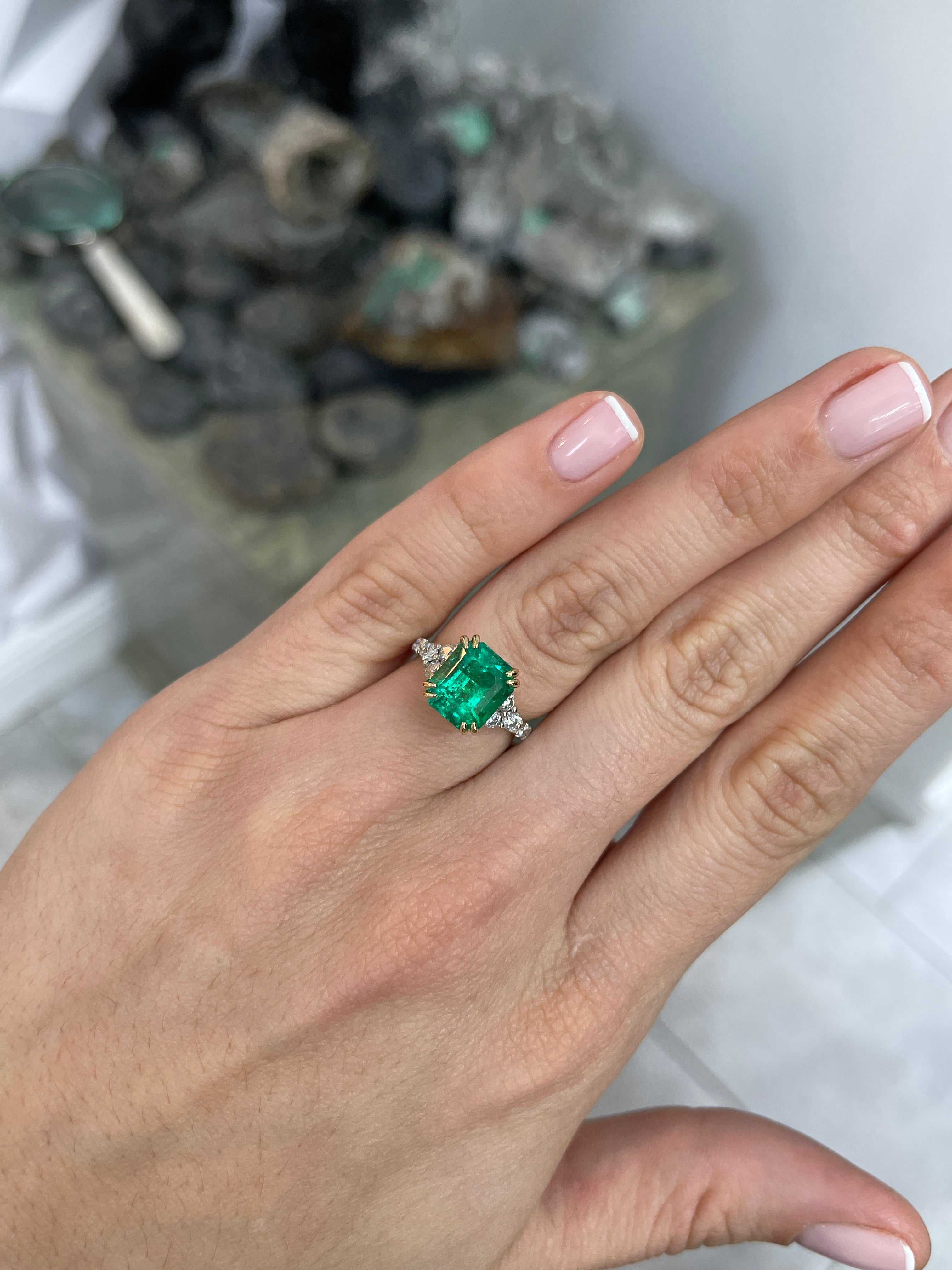 4.69tcw Emerald Cut Colombian Emerald 7 Stone with Hidden Diamond Halo & Shank 18K