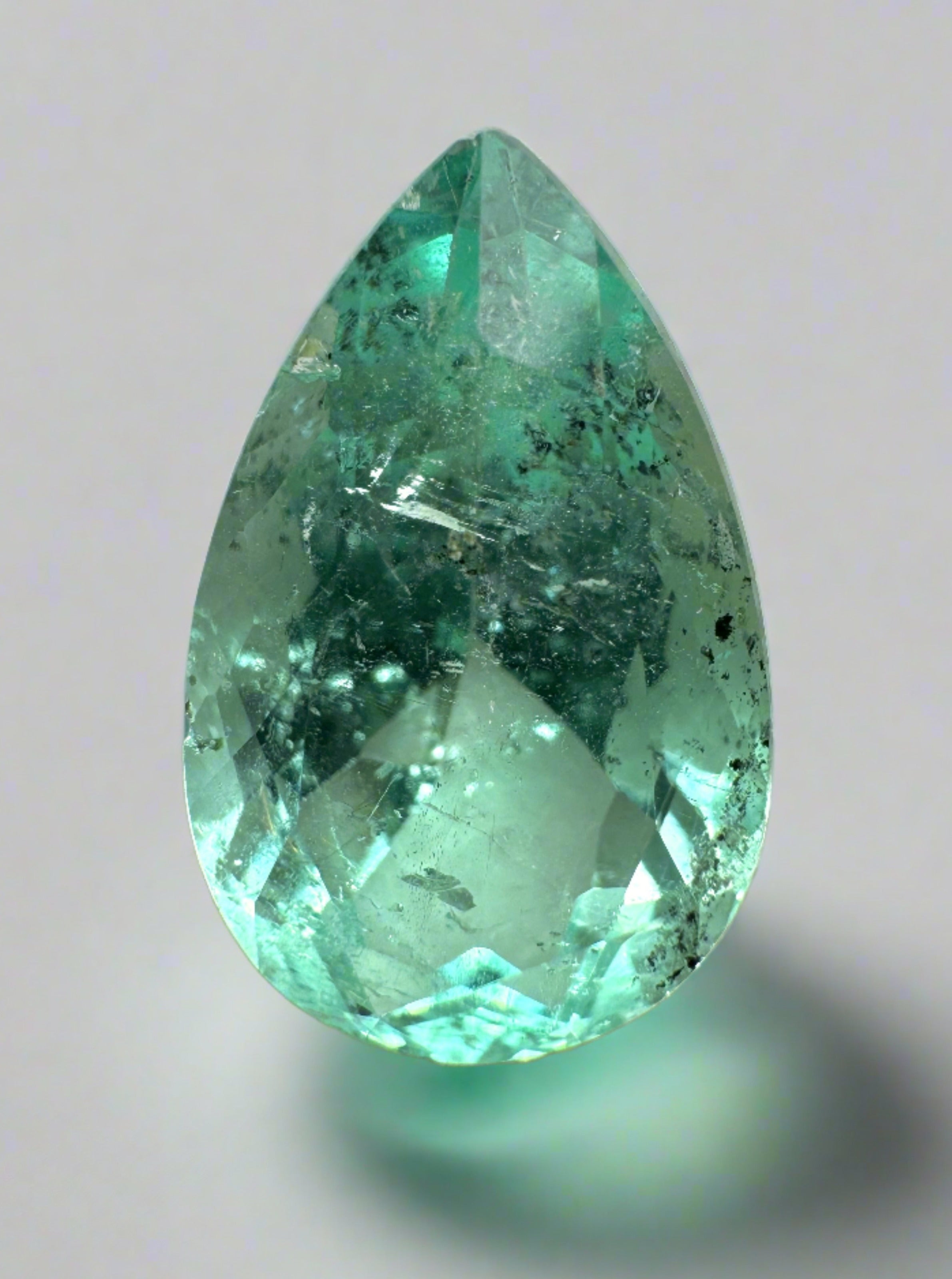 6.41 Carat 16x10 Light Green Freckled Natural Loose Colombian Emerald-Pear Cut - JR Colombian Emeralds