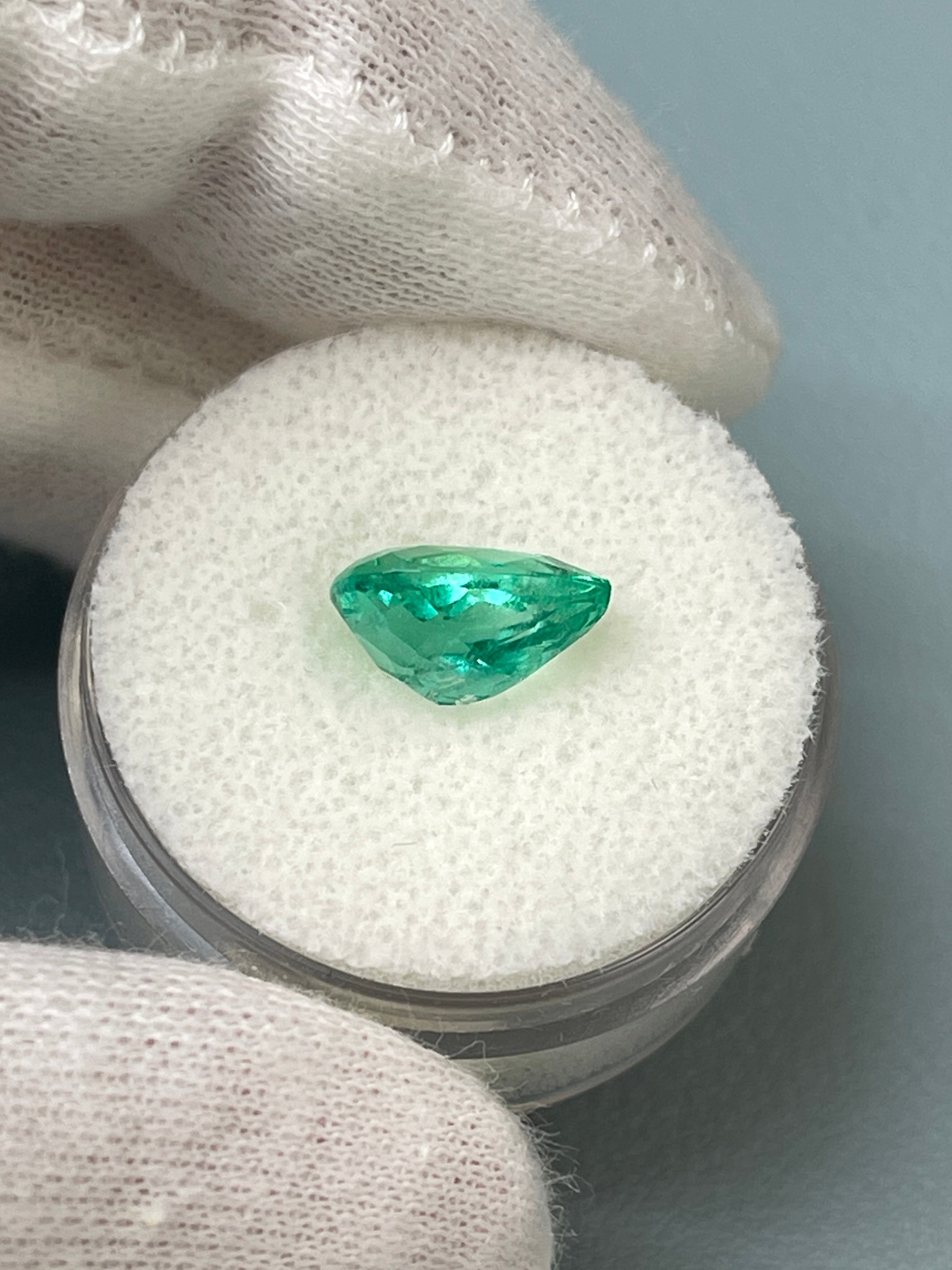 2.41 carat 10.5x7.5 Pastel Bluish Green Natural Loose Colombian Emerald-Pear Cut