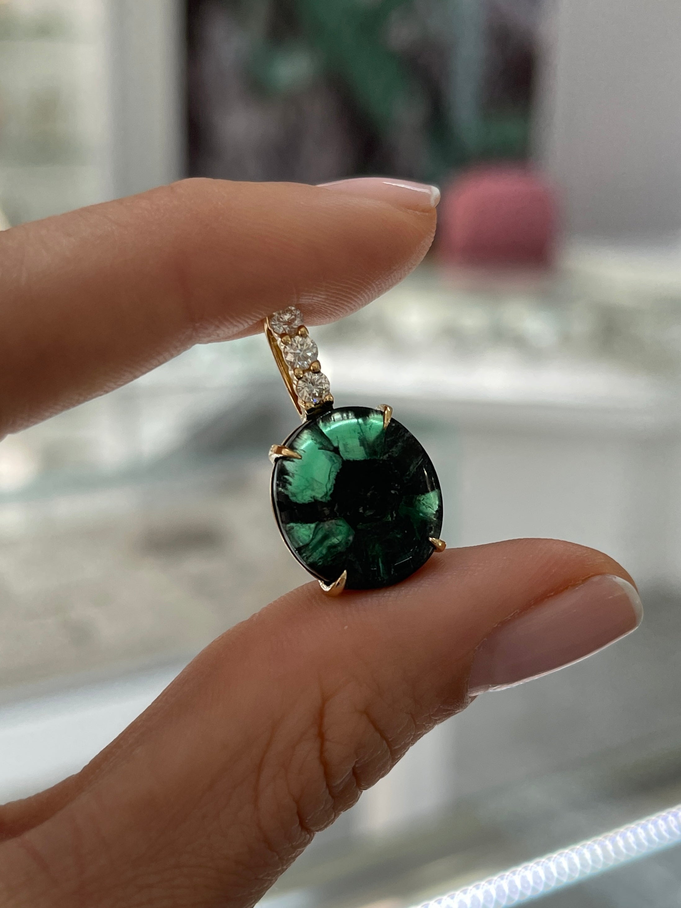 12.32tcw Oval Trapiche Colombian Emerald & Diamond Accented Pendant 18K