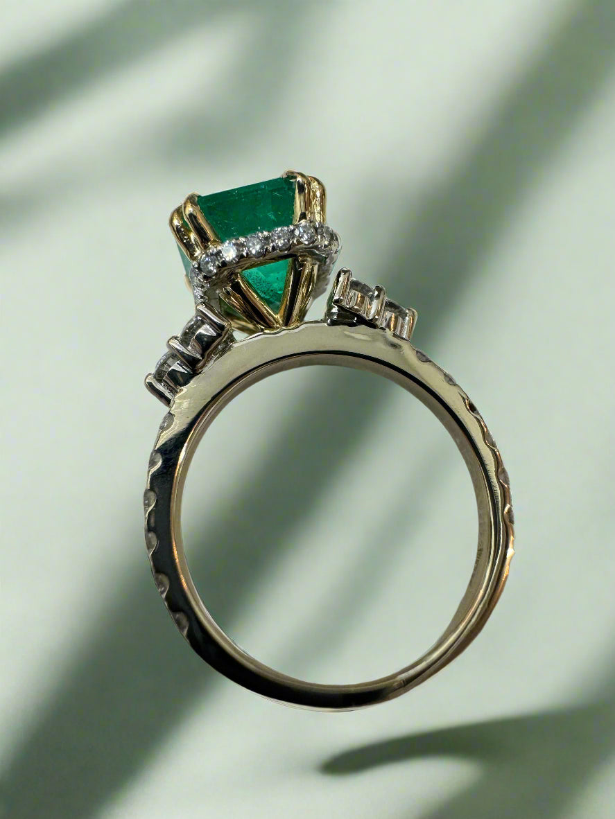 4.69tcw Emerald Cut Colombian Emerald 7 Stone with Hidden Diamond Halo & Shank 18K