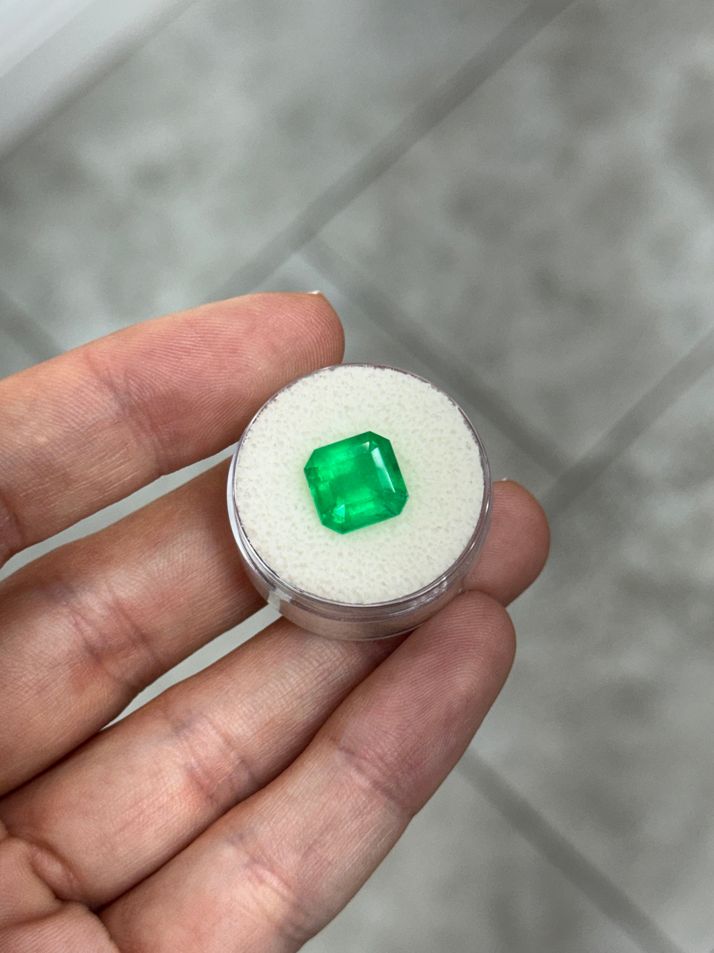 4.35-carat 10x10mm Colombian emerald loose gemstone with Kryptonite glow, Asscher cut from JR Colombian Emeralds.