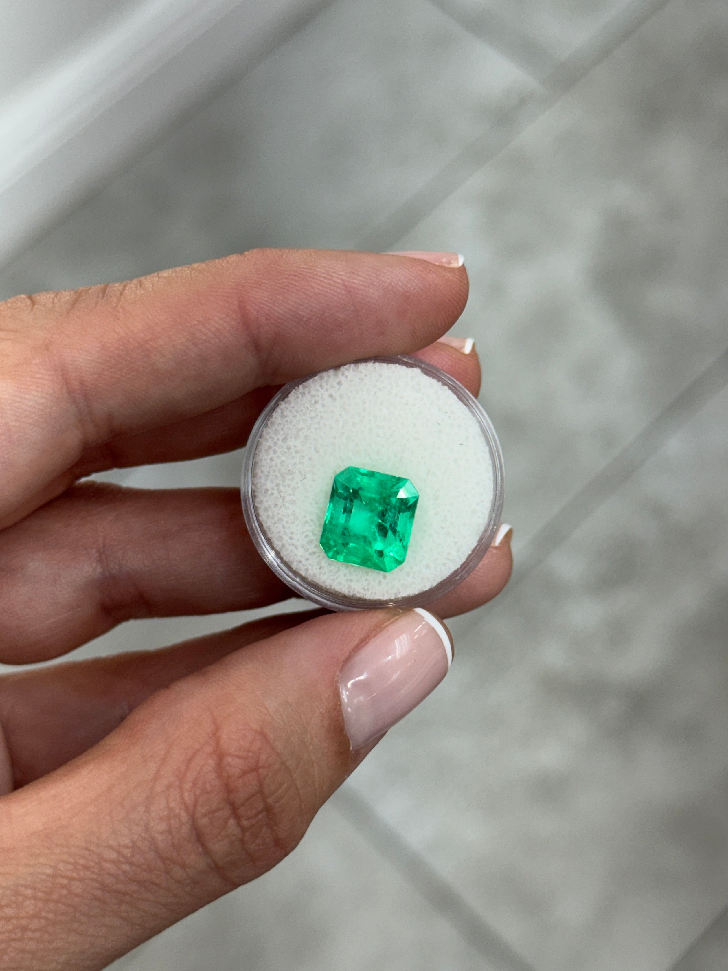 11x10mm vivacious bluish green Colombian emerald loose gemstone, Asscher cut, 4.75 carats, from JR Colombian Emeralds.
