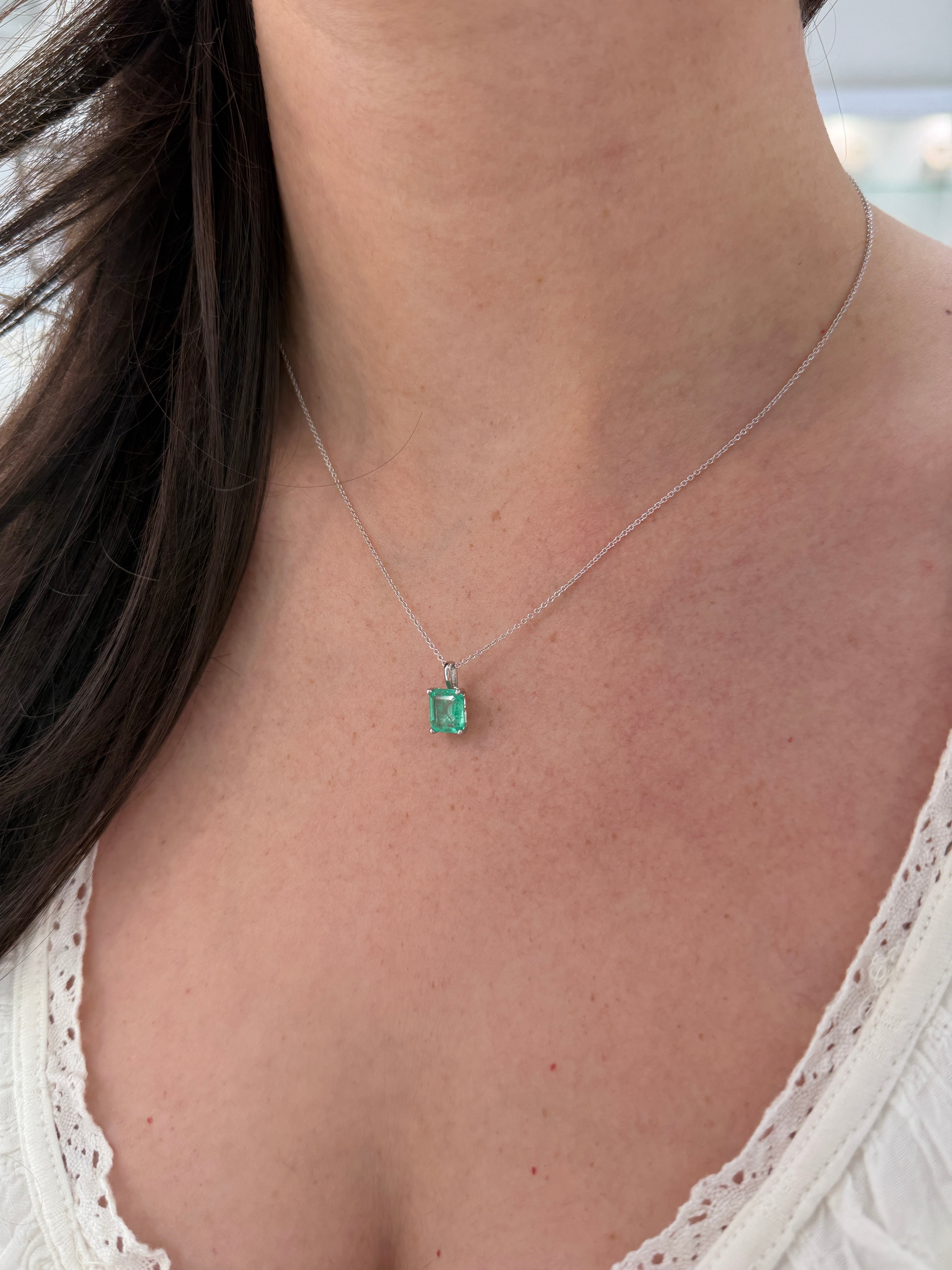 14K white gold Colombian emerald fleur-de-lis necklace with a 2.20 carat solitaire emerald from JR Colombian Emeralds.