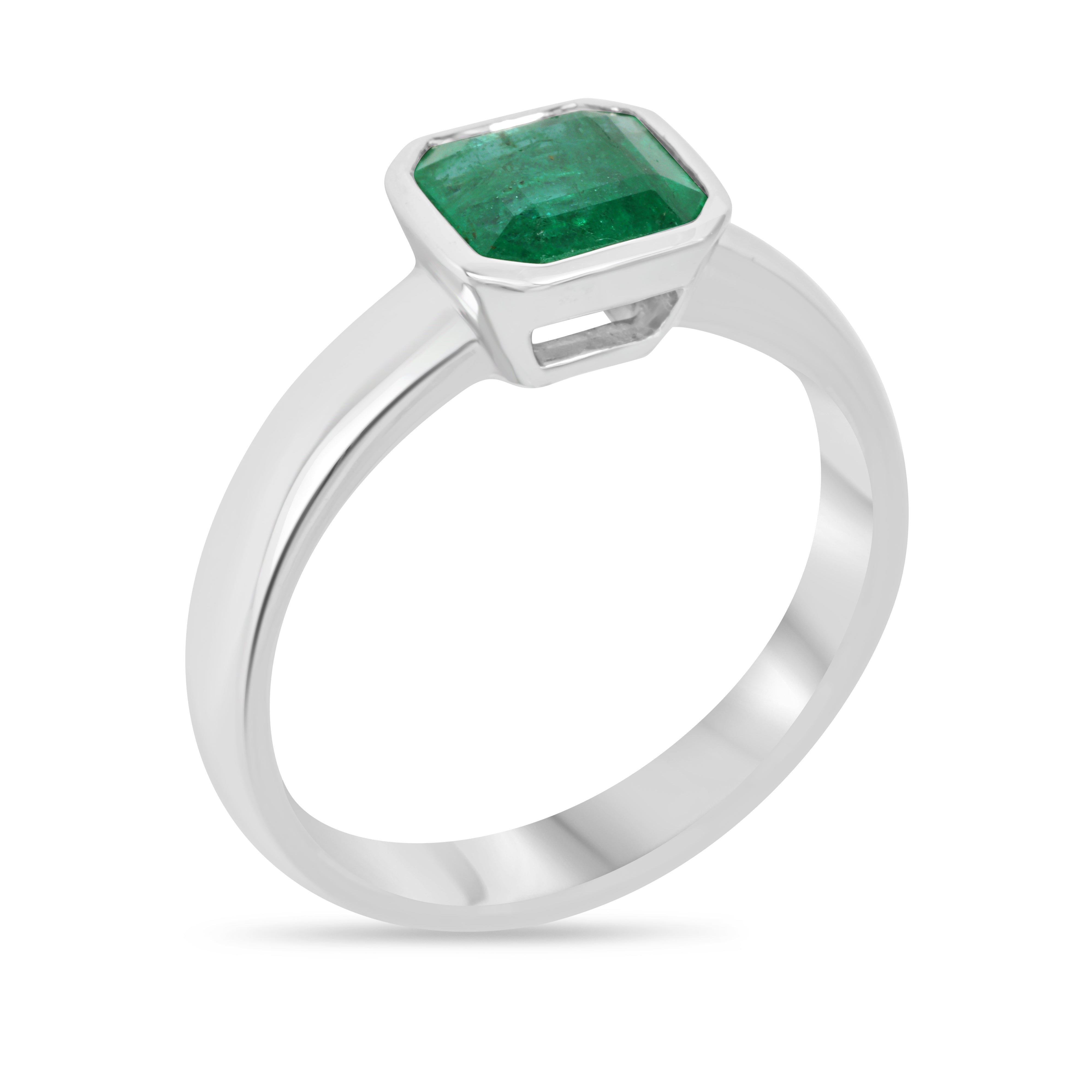 1.32 carat bezel set Asscher cut emerald white gold solitaire ring by JR Colombian Emeralds, showcasing the elegant gemstone.