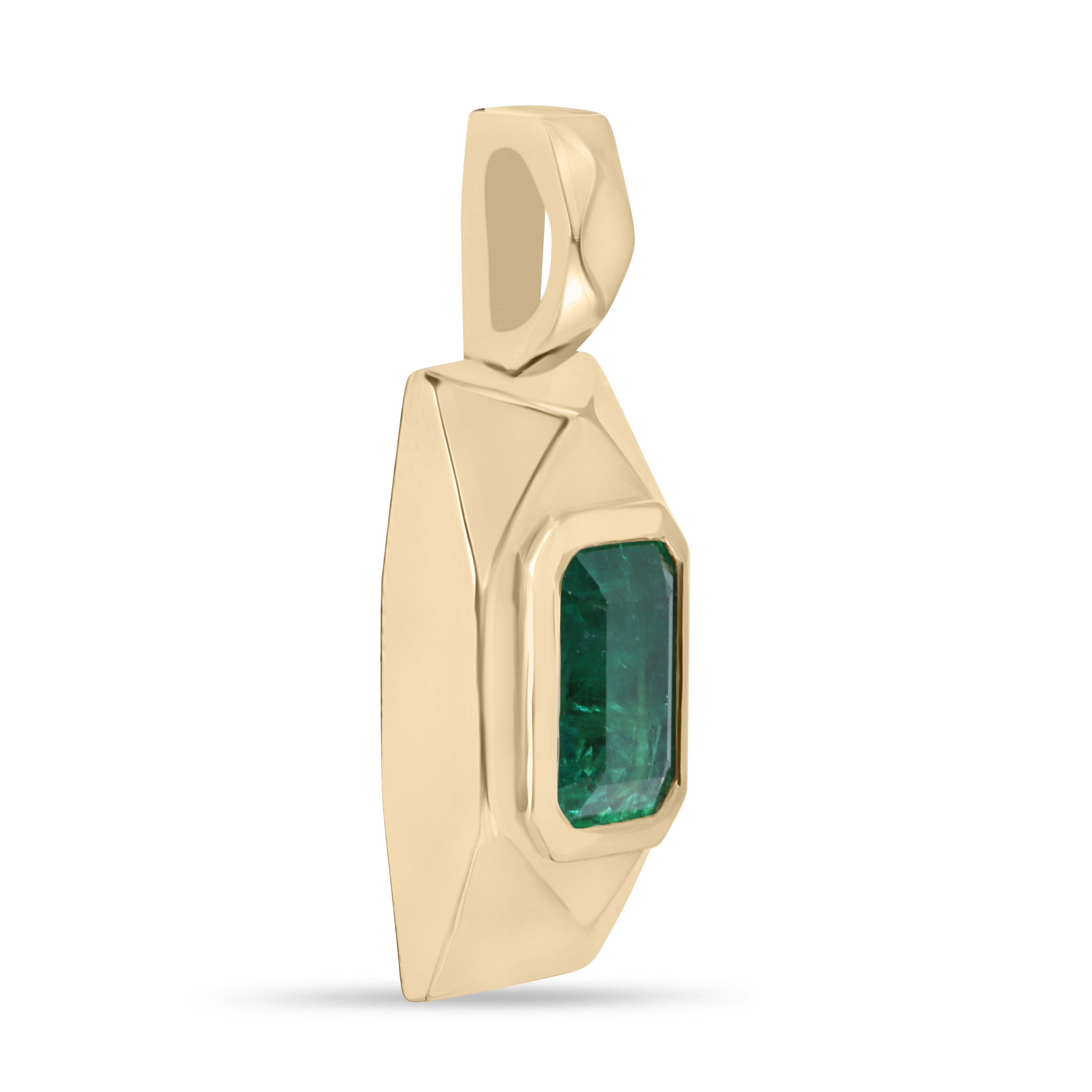 14K gold emerald dog tag pendant with 2.35 carats of sparkling green Colombian emeralds, stylish and elegant jewelry piece.