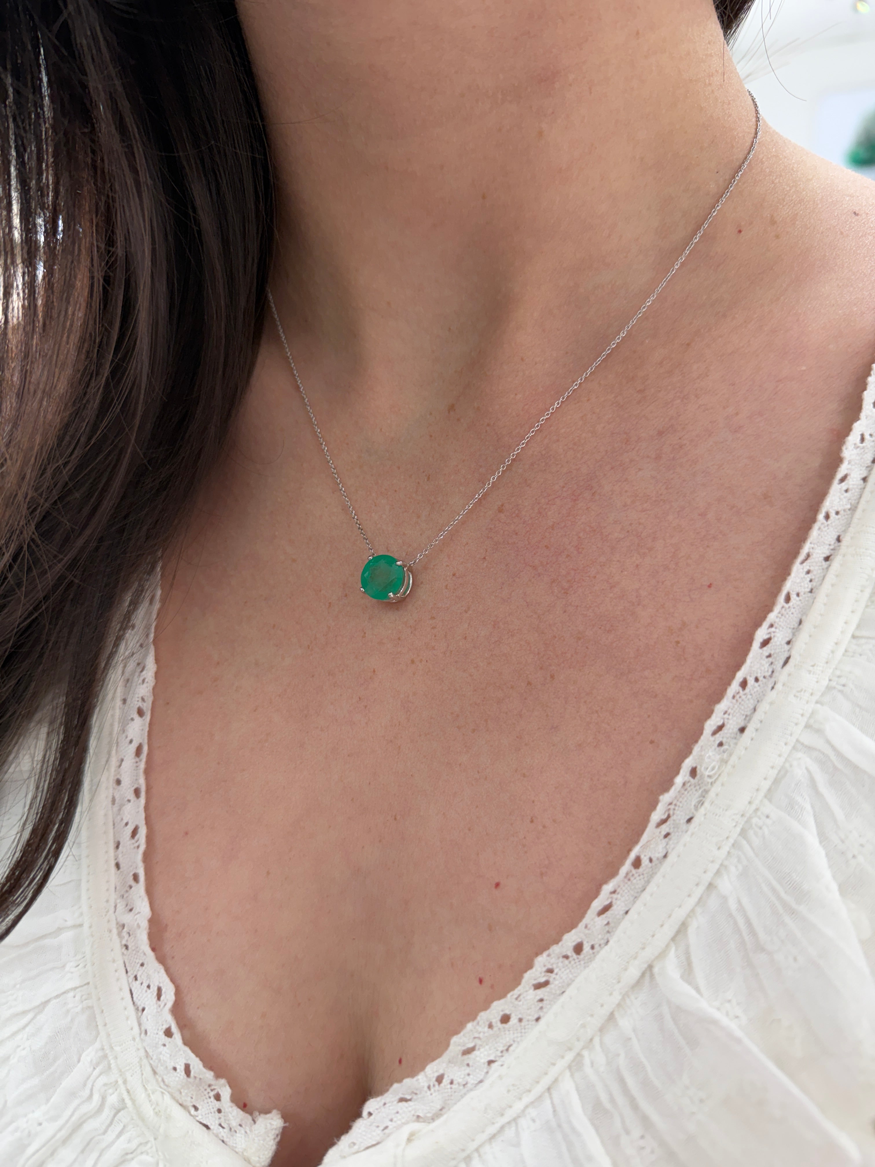 18K gold stationary necklace featuring a 4.45ct natural round Colombian emerald by JR Colombian Emeralds.