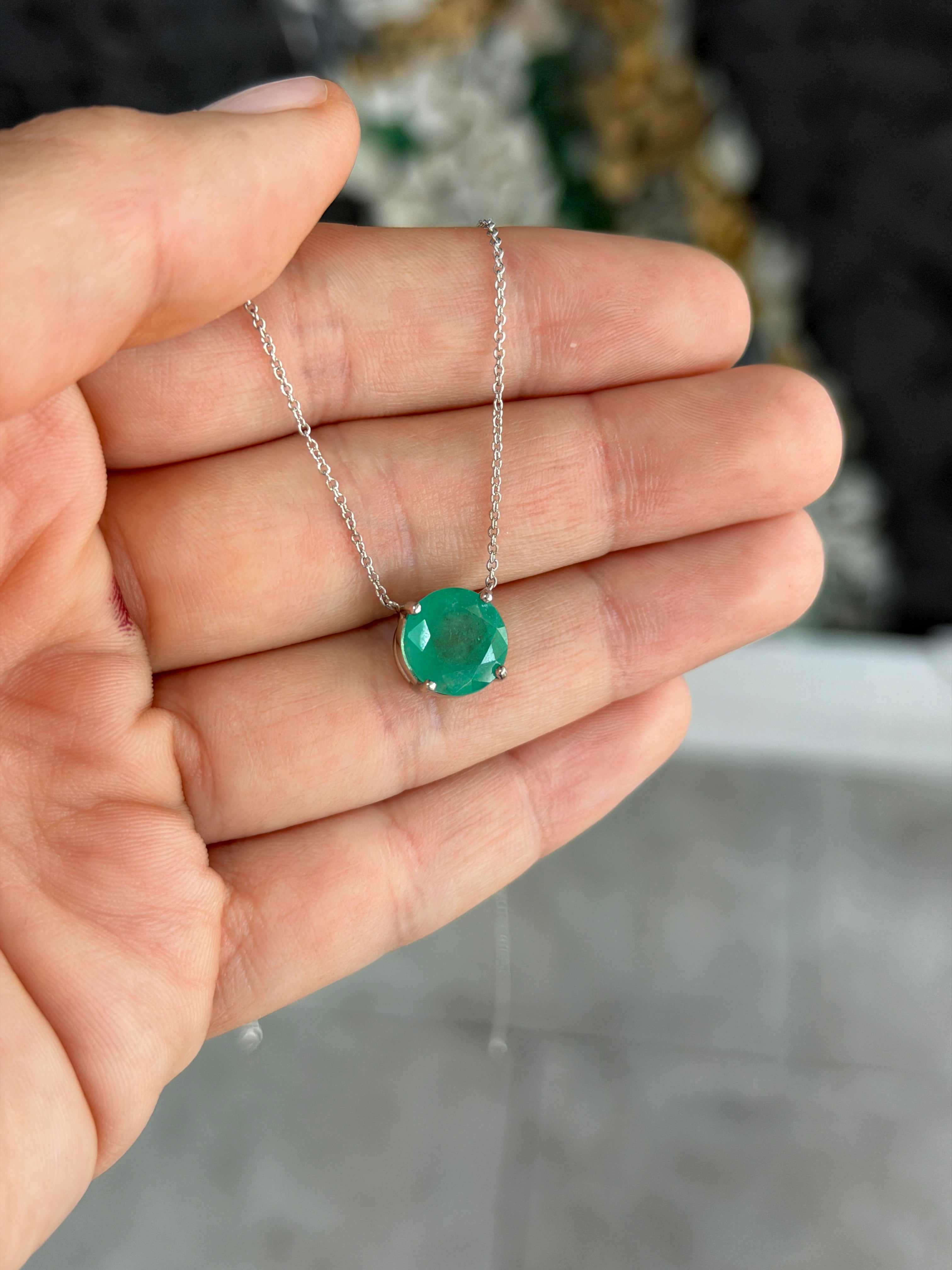 18K gold necklace featuring a 4.45ct natural round Colombian emerald, elegantly designed by JR Colombian Emeralds.