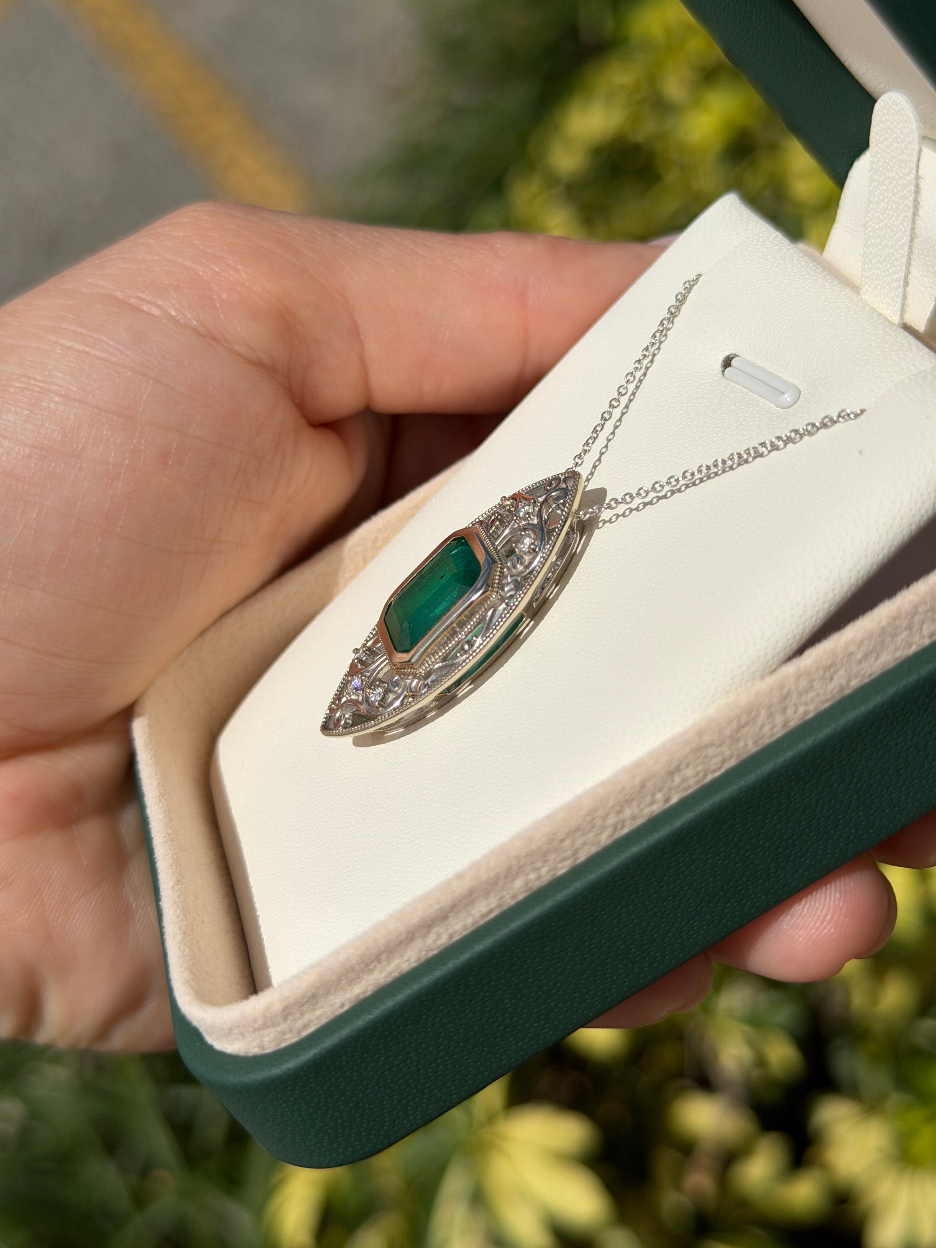 Art Deco inspired emerald cut emerald vintage diamond slider necklace in 14K gold with filigree details by JR Colombian Emeralds