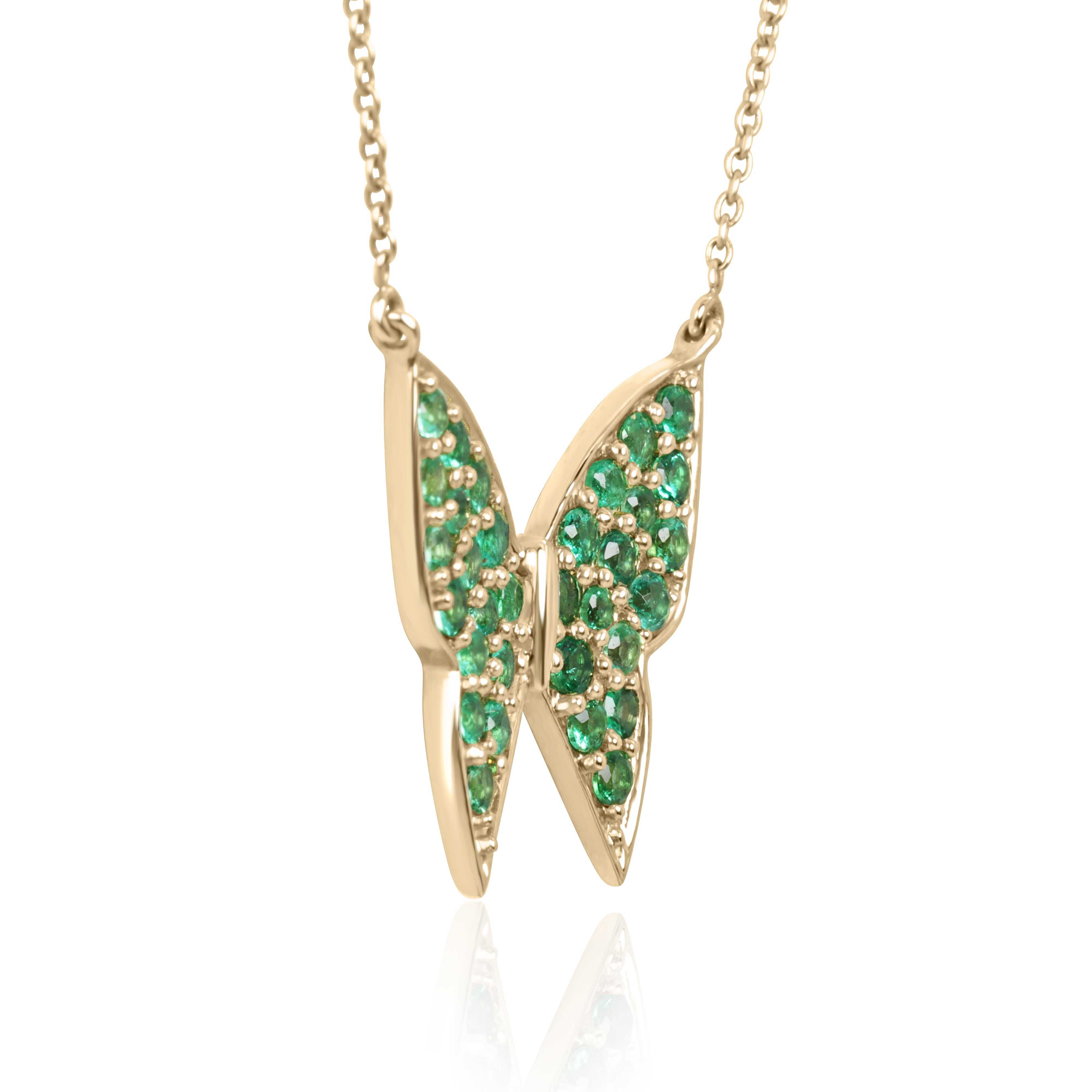 14K gold butterfly necklace with pave emeralds, featuring a fluttering butterfly pendant, worn as seen on Instagram.