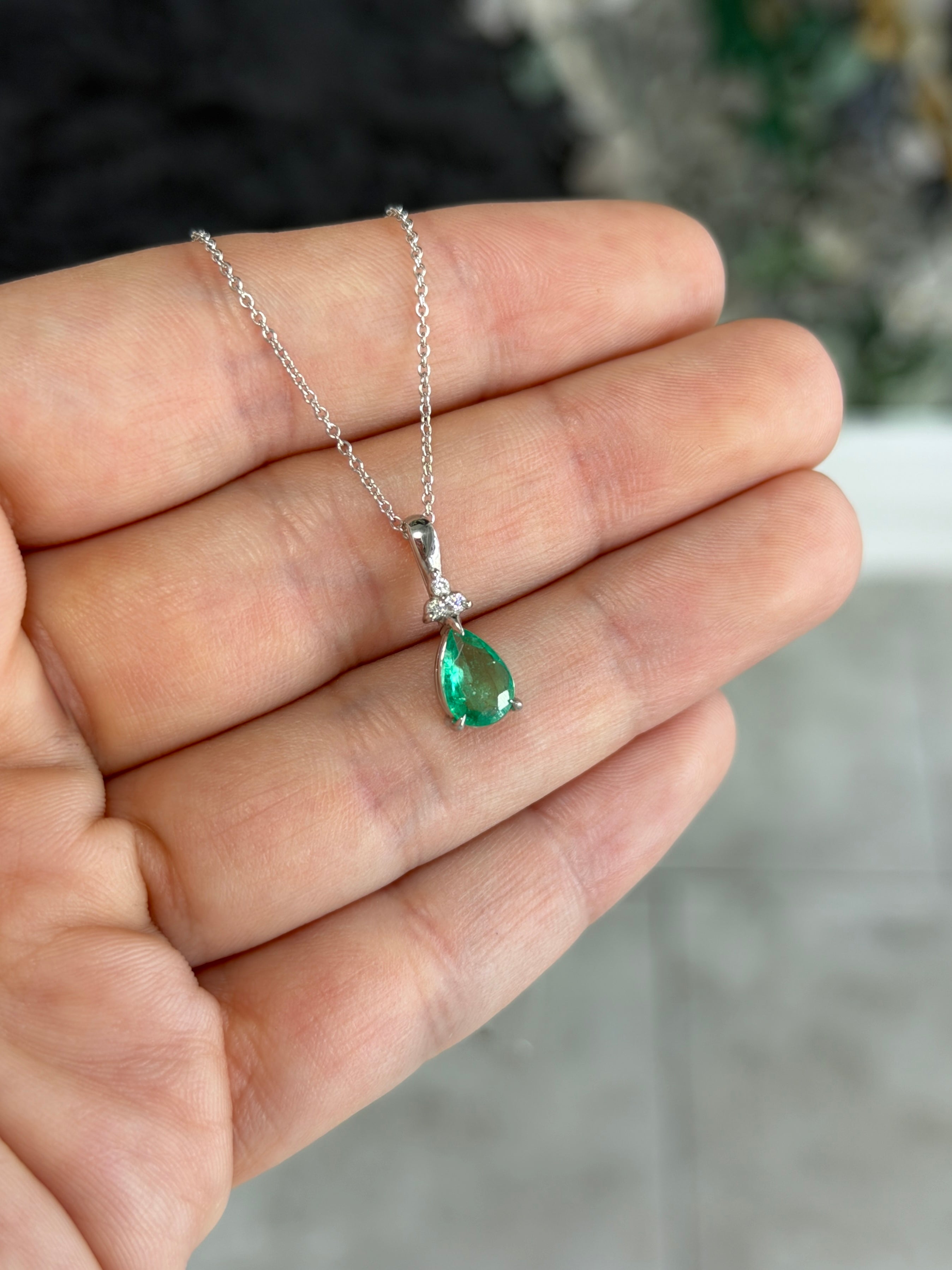 Pear-shaped emerald drop pendant with trefoil diamond cluster in 14K white gold, featuring 1.04tcw emerald from JR Colombian Emeralds.