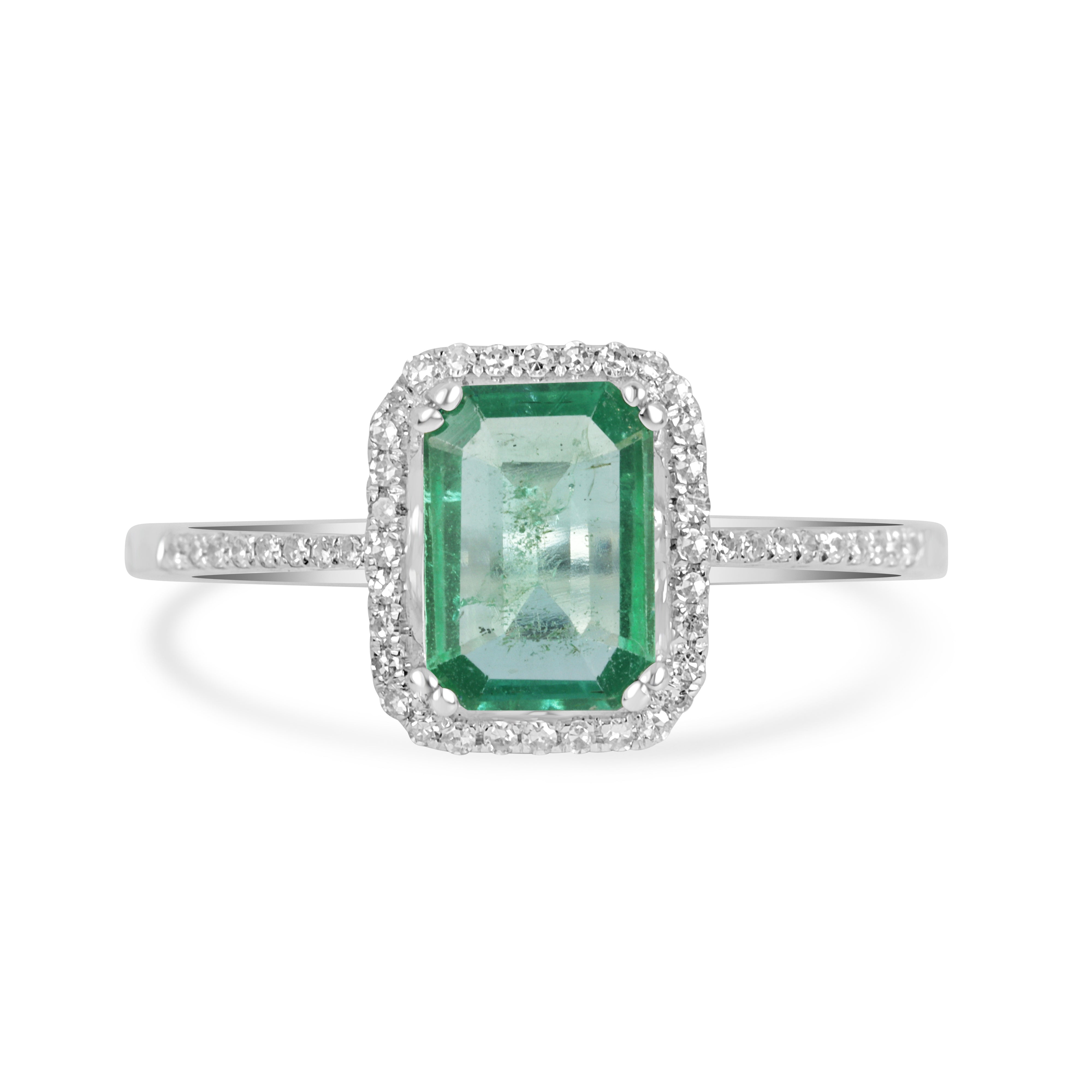 10x7.5mm emerald and diamond halo engagement ring in 14K white gold with crystal clear accents, by JR Colombian Emeralds.
