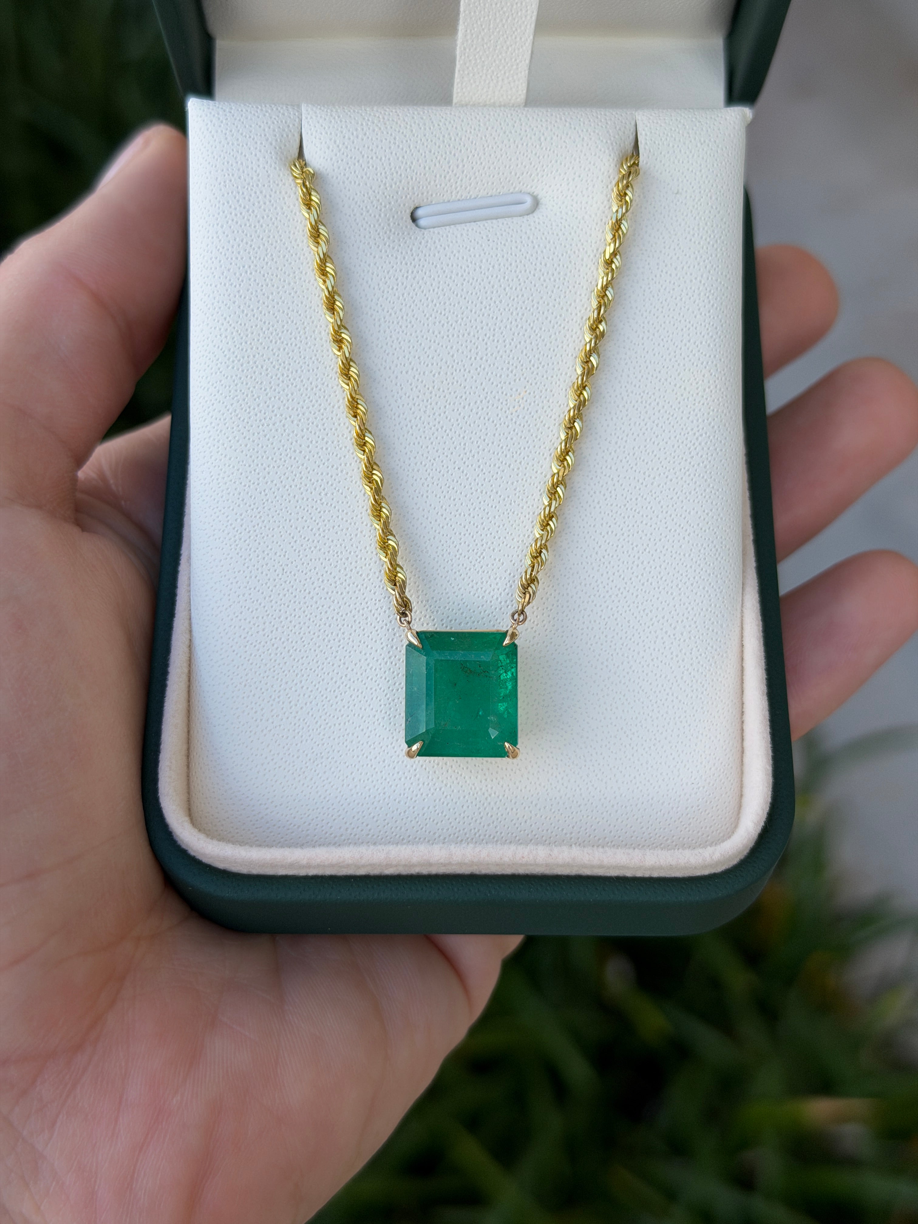 14K emerald cut emerald solitaire necklace with 10.38 carats, on a 20-inch stationary rope chain by JR Colombian Emeralds