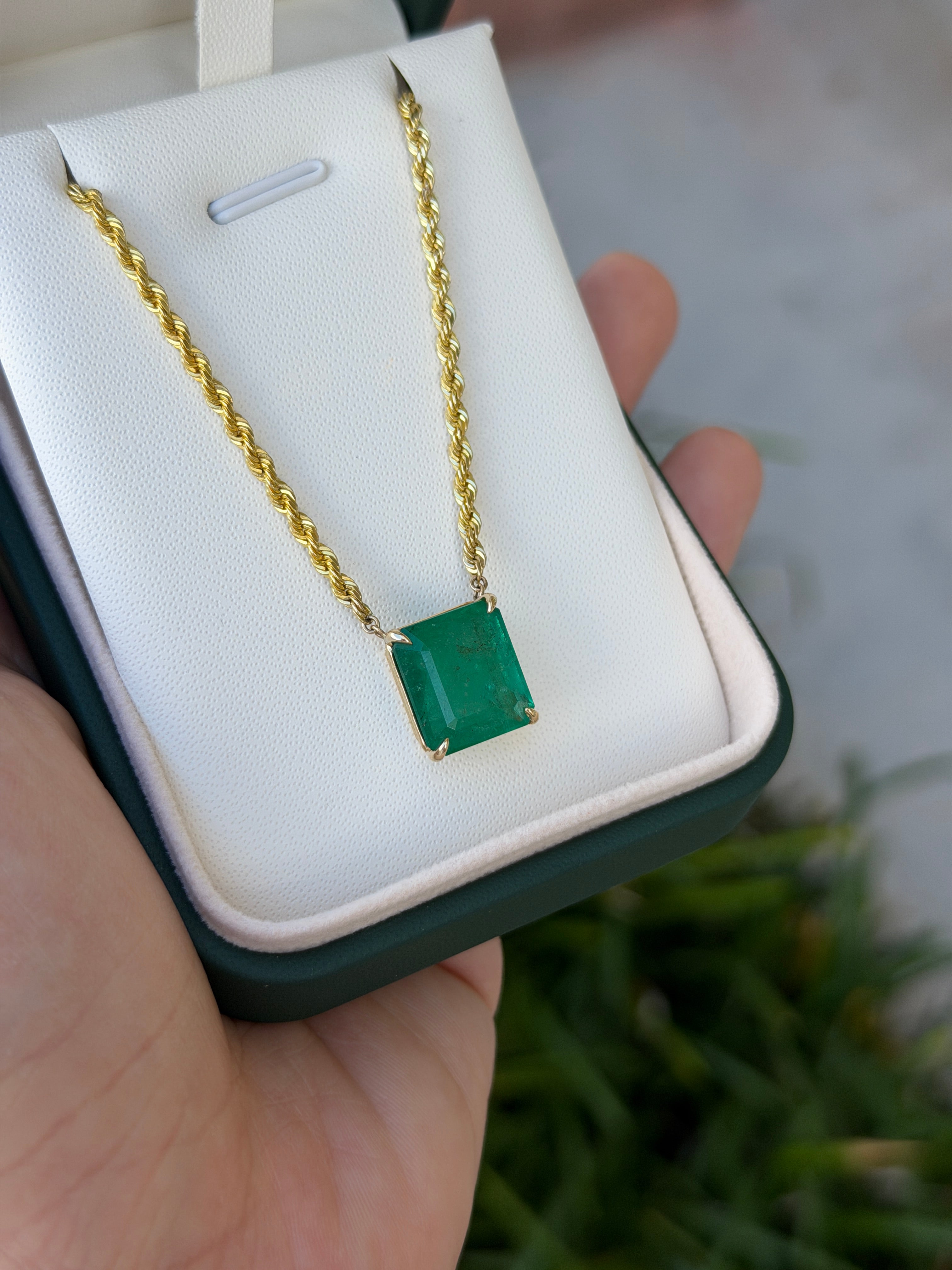 14K emerald cut emerald solitaire pendant on a 20-inch rope chain, jewelry from JR Colombian Emeralds.