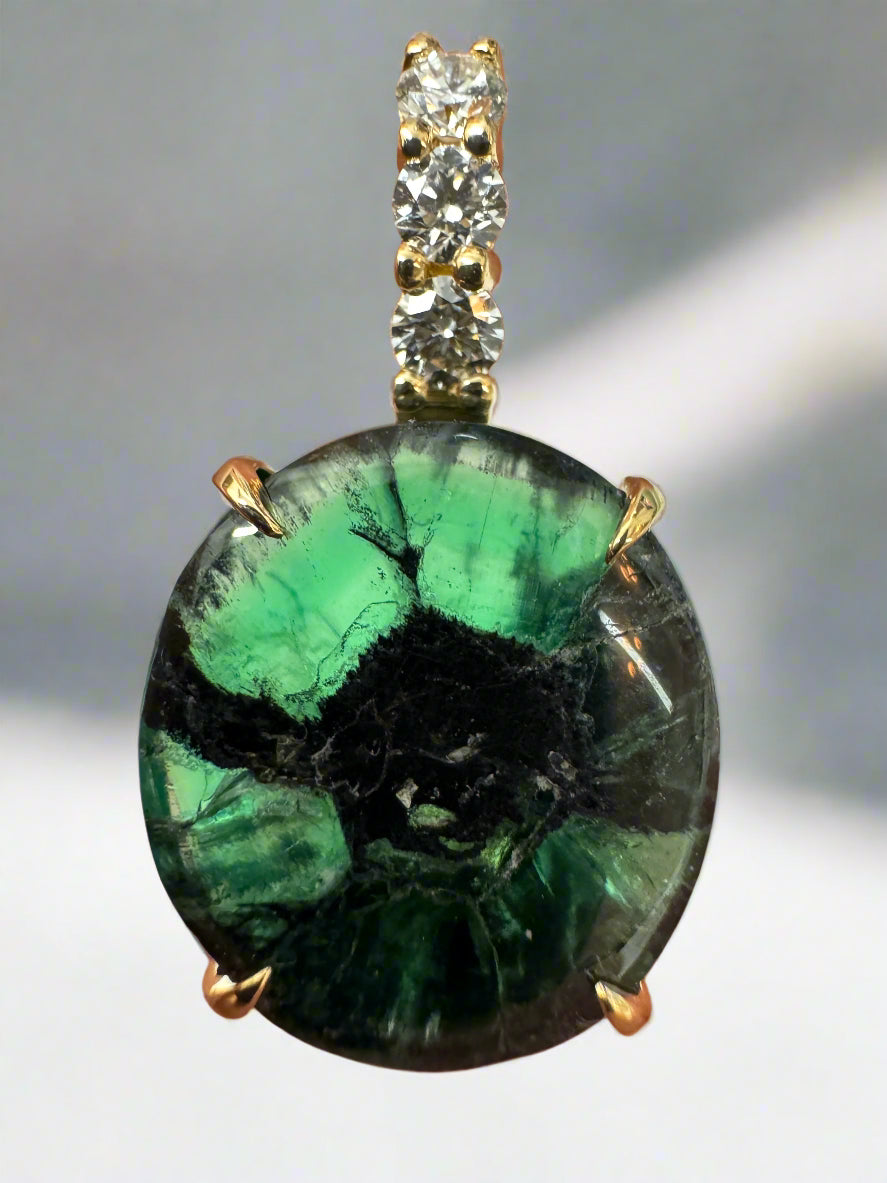 12.32tcw Oval Trapiche Colombian Emerald & Diamond Accented Pendant 18K