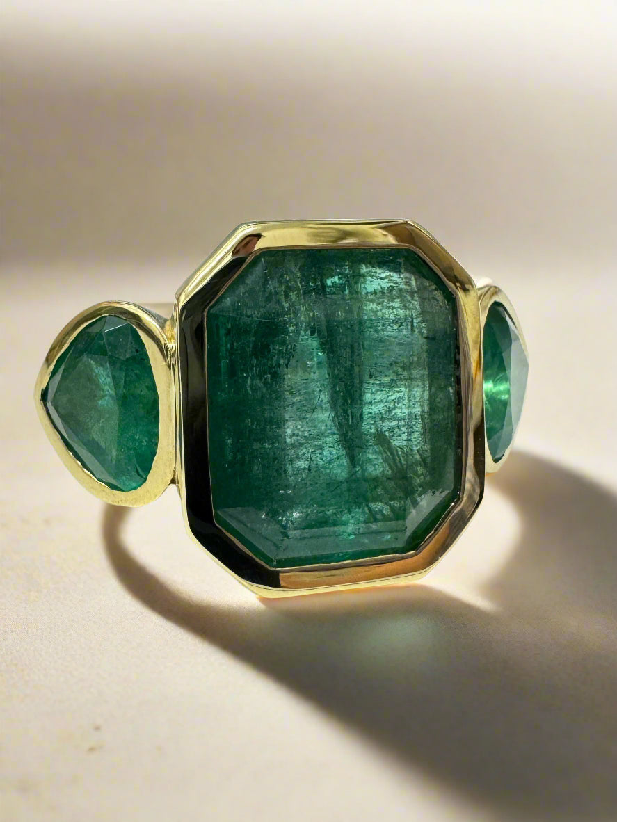 15.44tcw Three-Stone Emerald Ring with 11.32-Carat Zambian Emerald and Pear-Cut Accents in 18K Gold