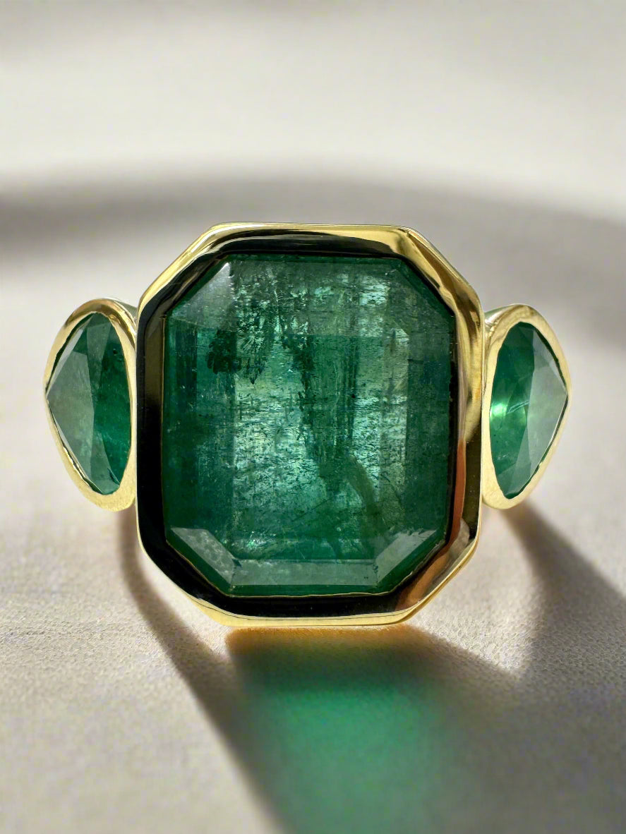 15.44tcw Three-Stone Emerald Ring with 11.32-Carat Zambian Emerald and Pear-Cut Accents in 18K Gold