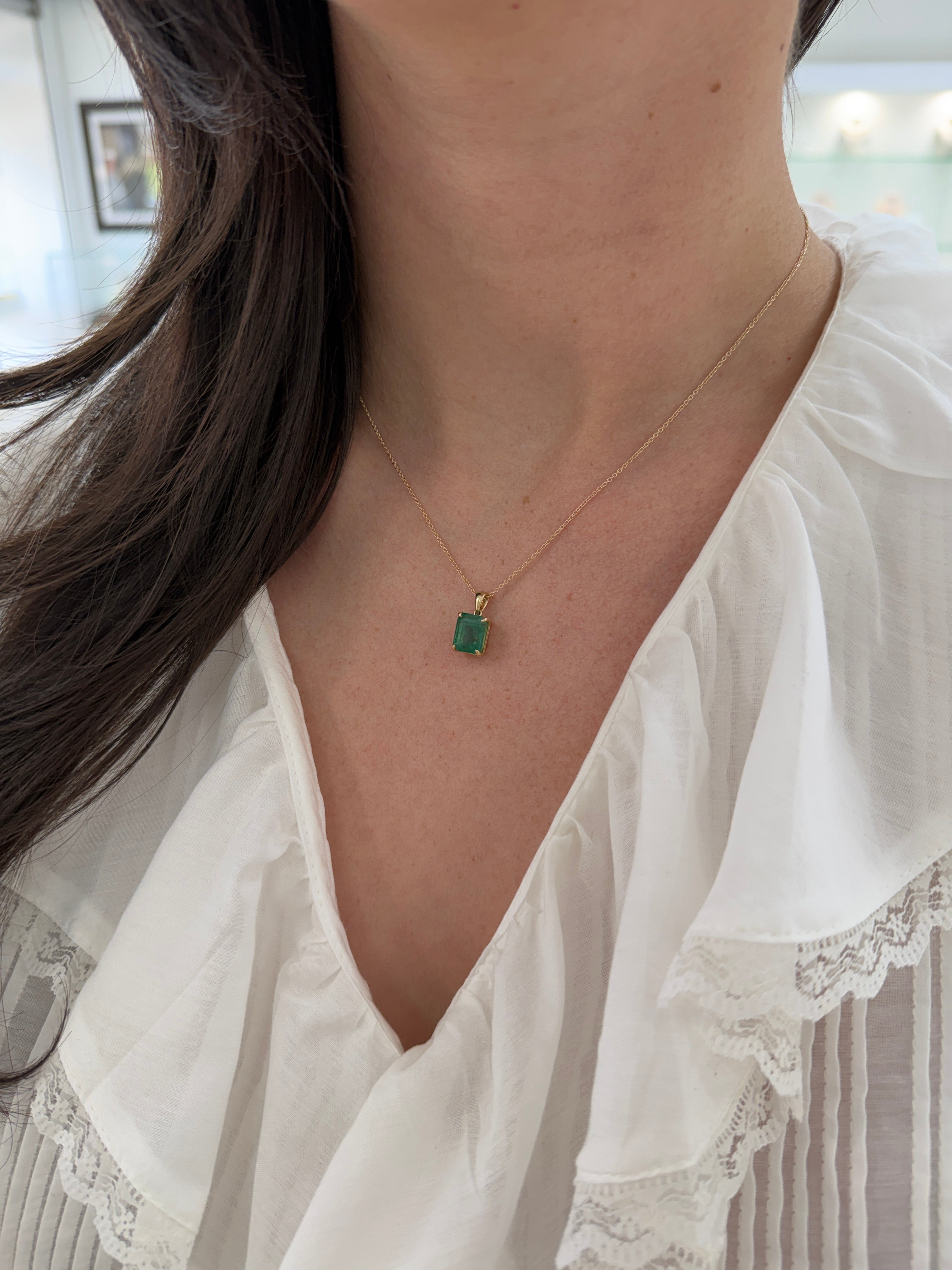 14K gold emerald solitaire necklace featuring a 4.25 carat natural earthy Colombian emerald, elegant jewelry piece by JR Colombian Emeralds.