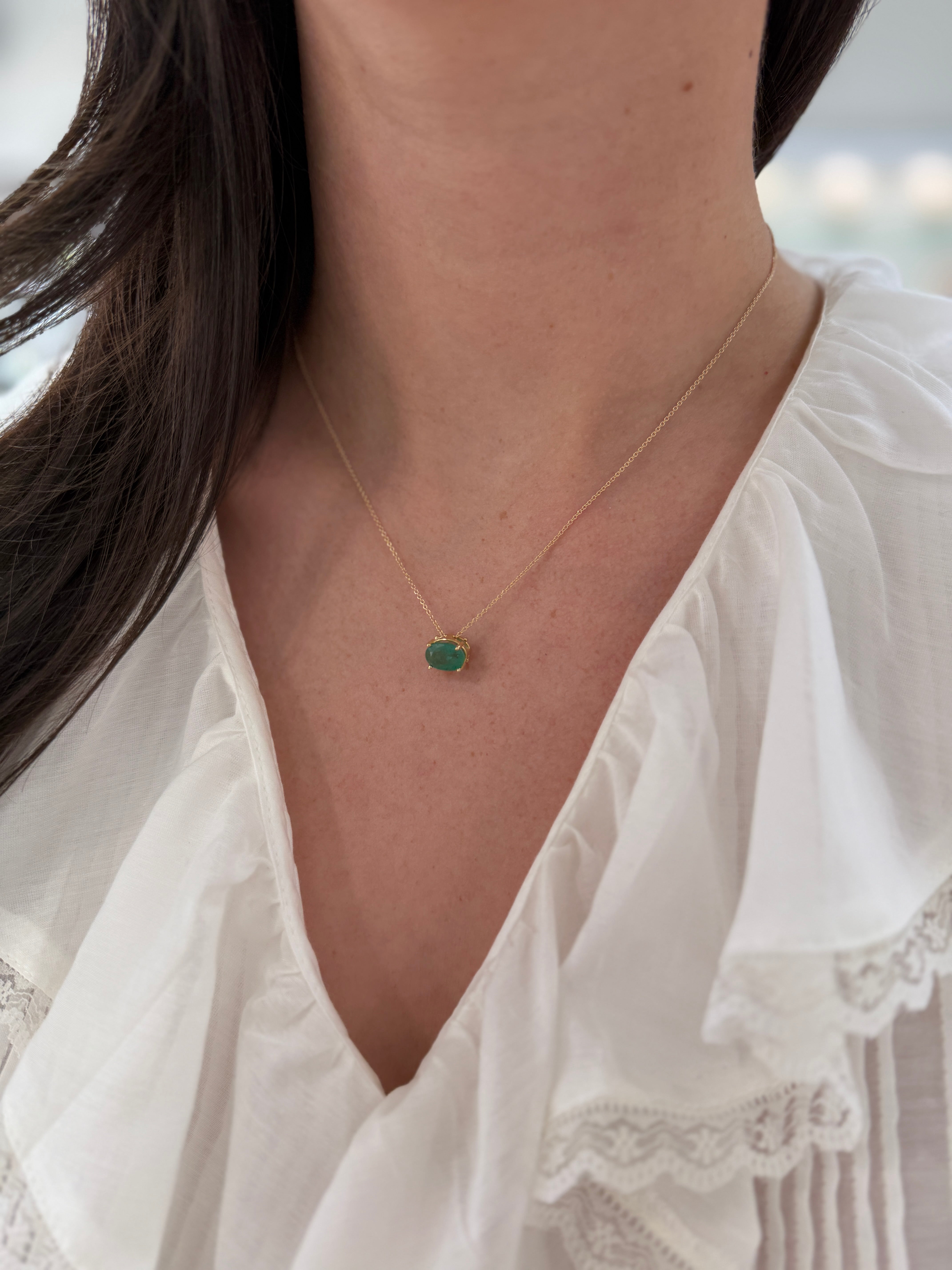 14K gold solitaire emerald oval slider necklace featuring a 2.15 carat emerald, convertible design from JR Colombian Emeralds.