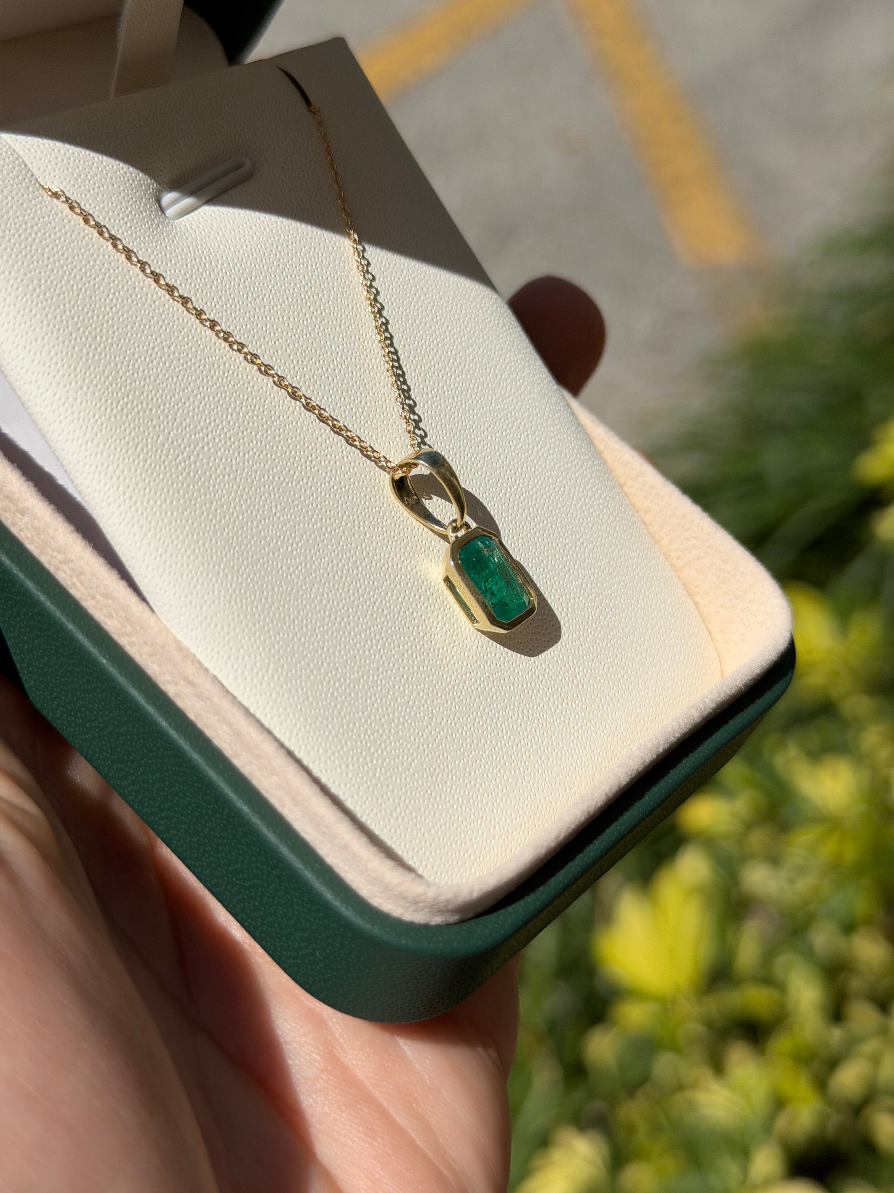 14K natural emerald bezel necklace with large bail, featuring a 1.80 carat emerald pendant by JR Colombian Emeralds.