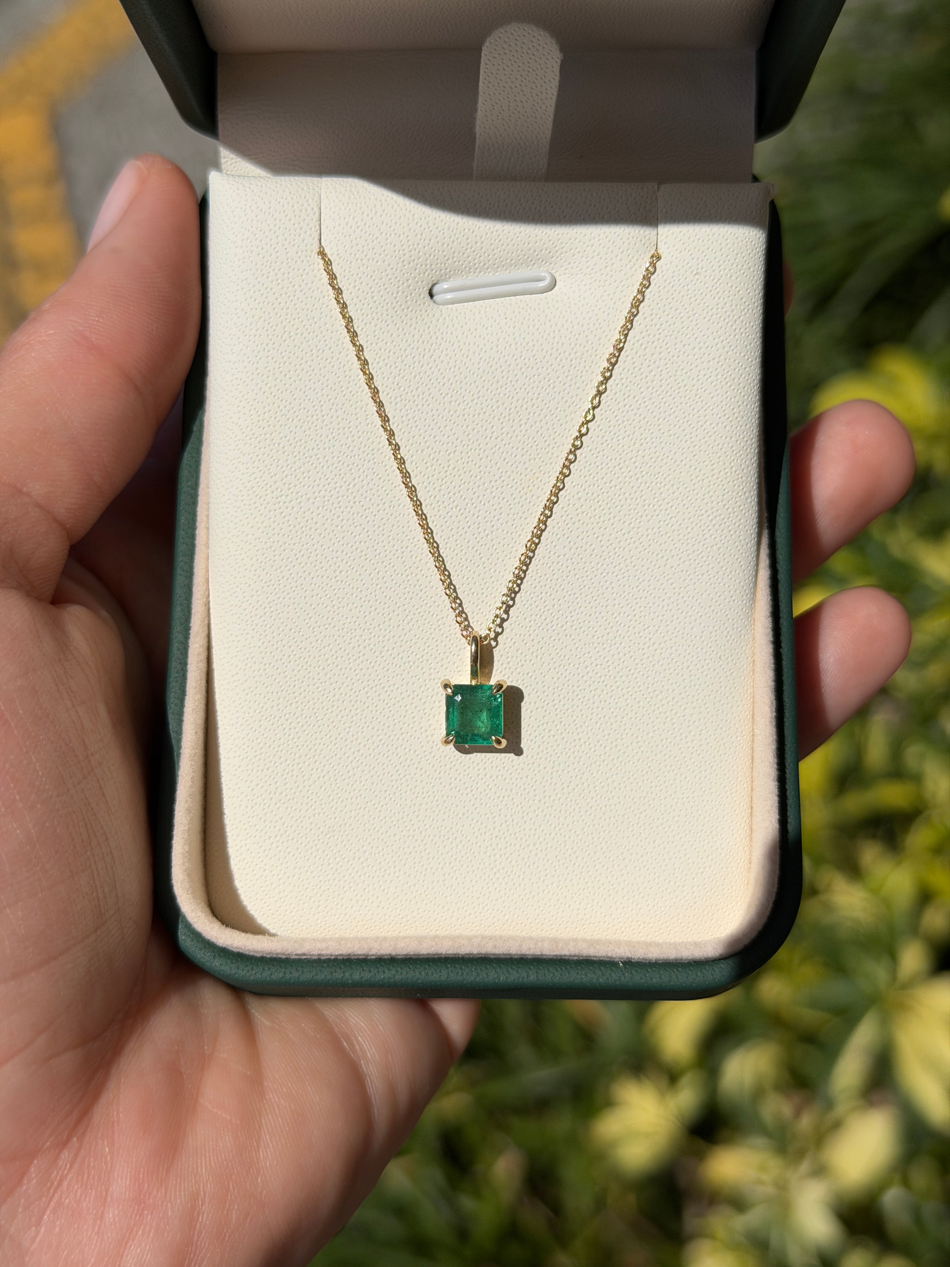 Petite 1.35 Carat Asscher cut emerald solitaire necklace in 14K gold from JR Colombian Emeralds.