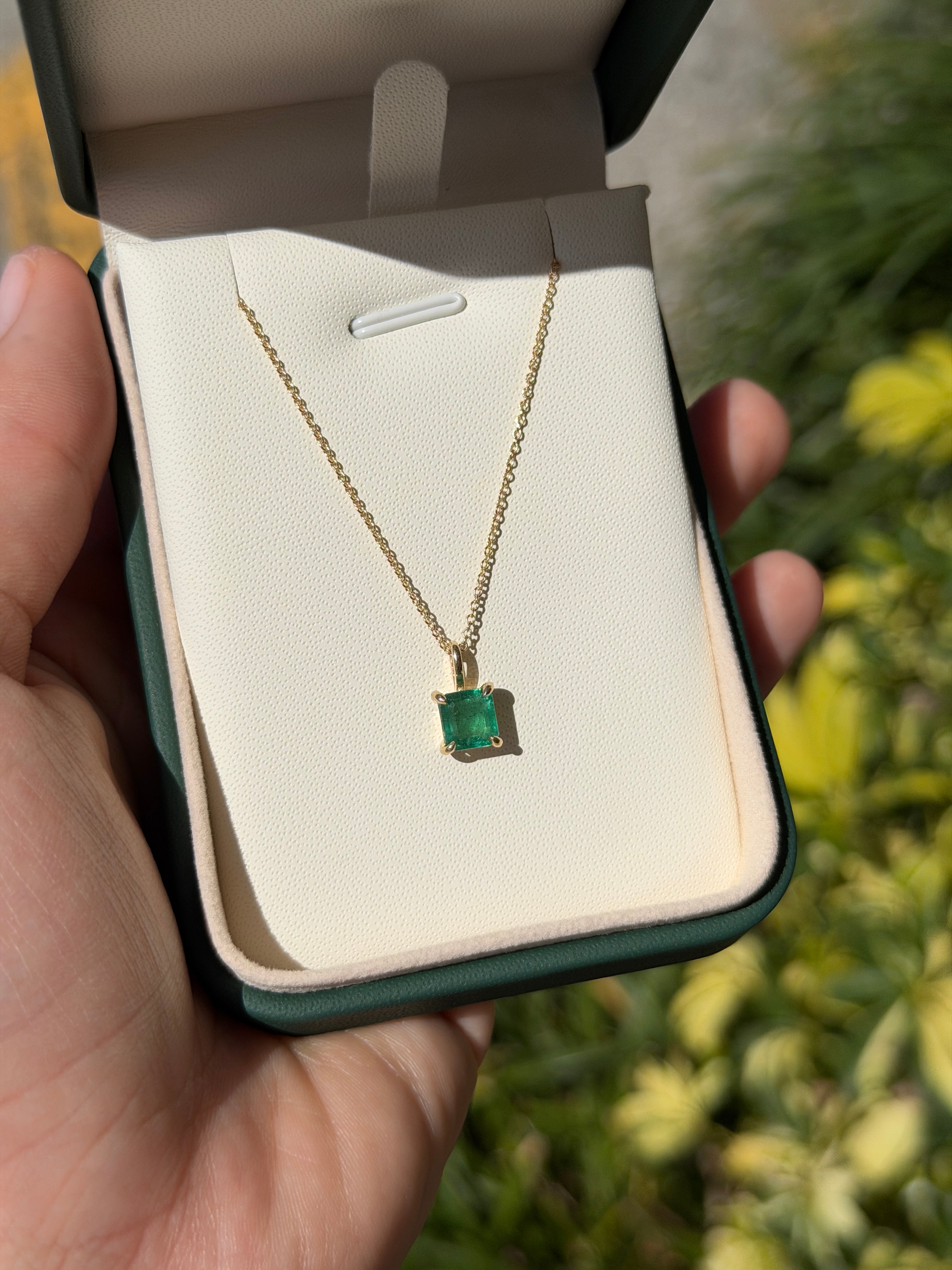 Petite 1.35 Carat Asscher Emerald Solitaire Necklace in 14K gold by JR Colombian Emeralds, showcasing the elegant emerald pendant.