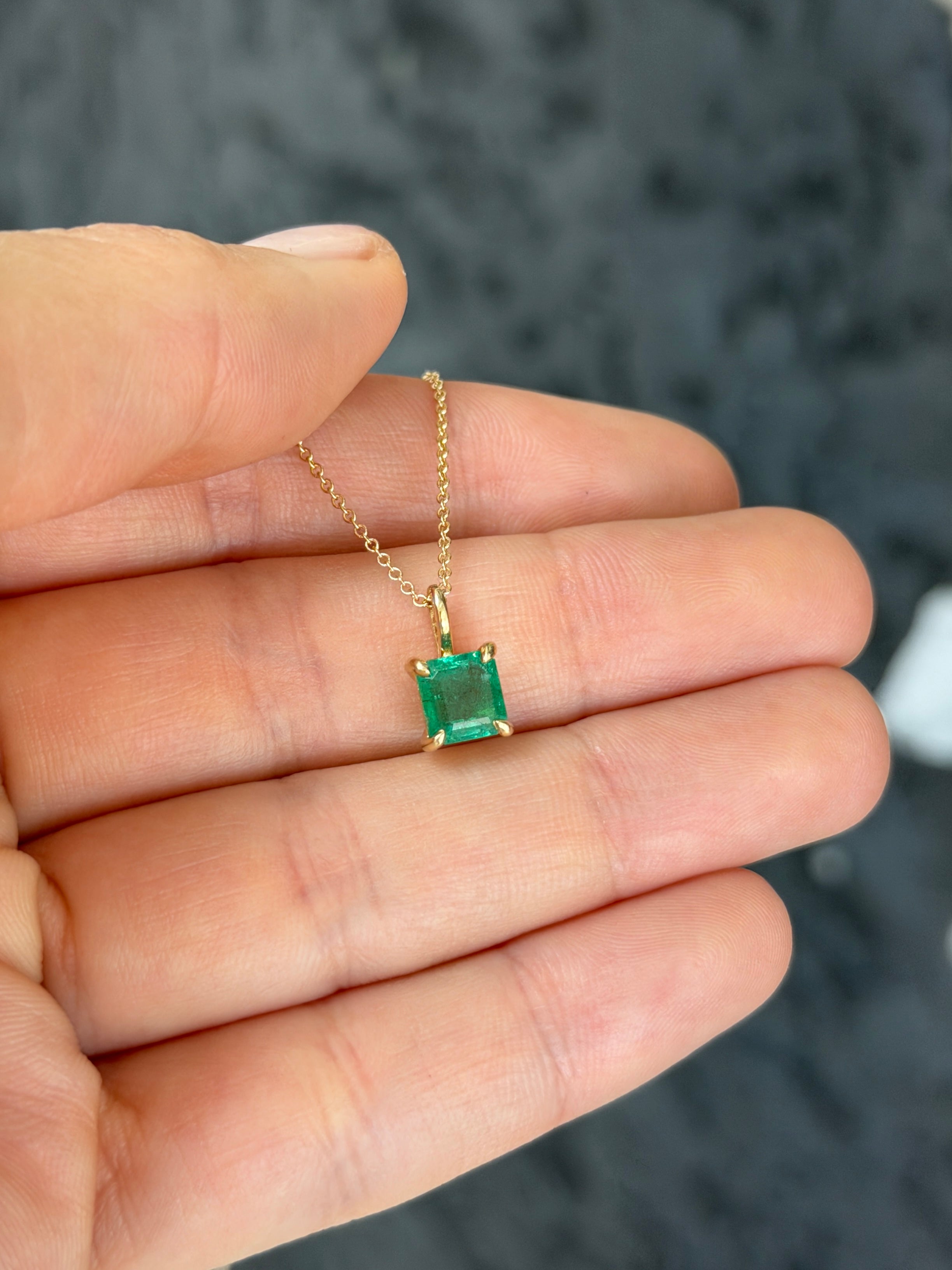Petite 1.35 Carat Asscher emerald solitaire necklace in 14K gold by JR Colombian Emeralds, showcasing a stunning emerald pendant.