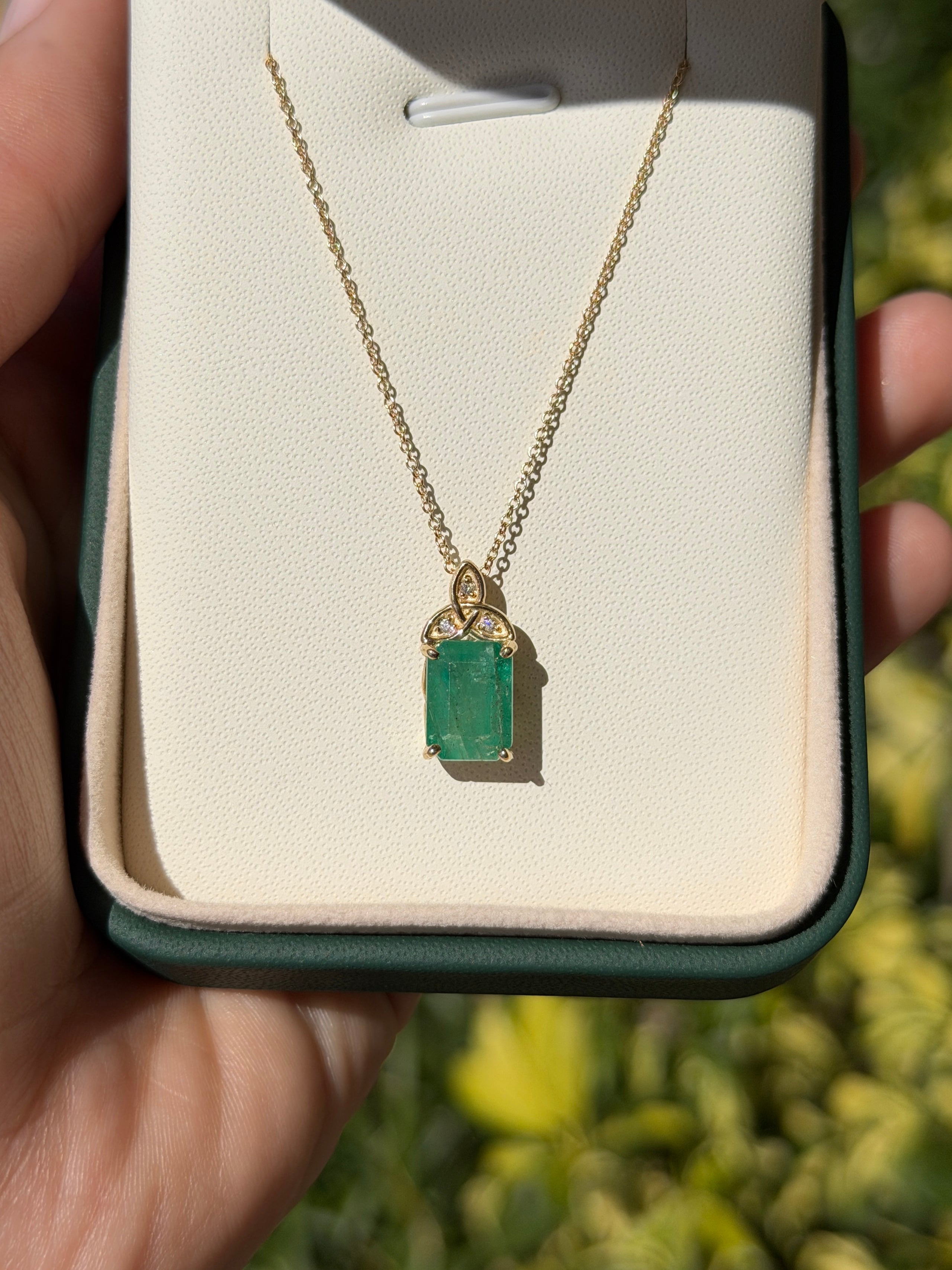 14K yellow gold Trinity Knot emerald solitaire necklace with a 2.12tcw gemstone from JR Colombian Emeralds.
