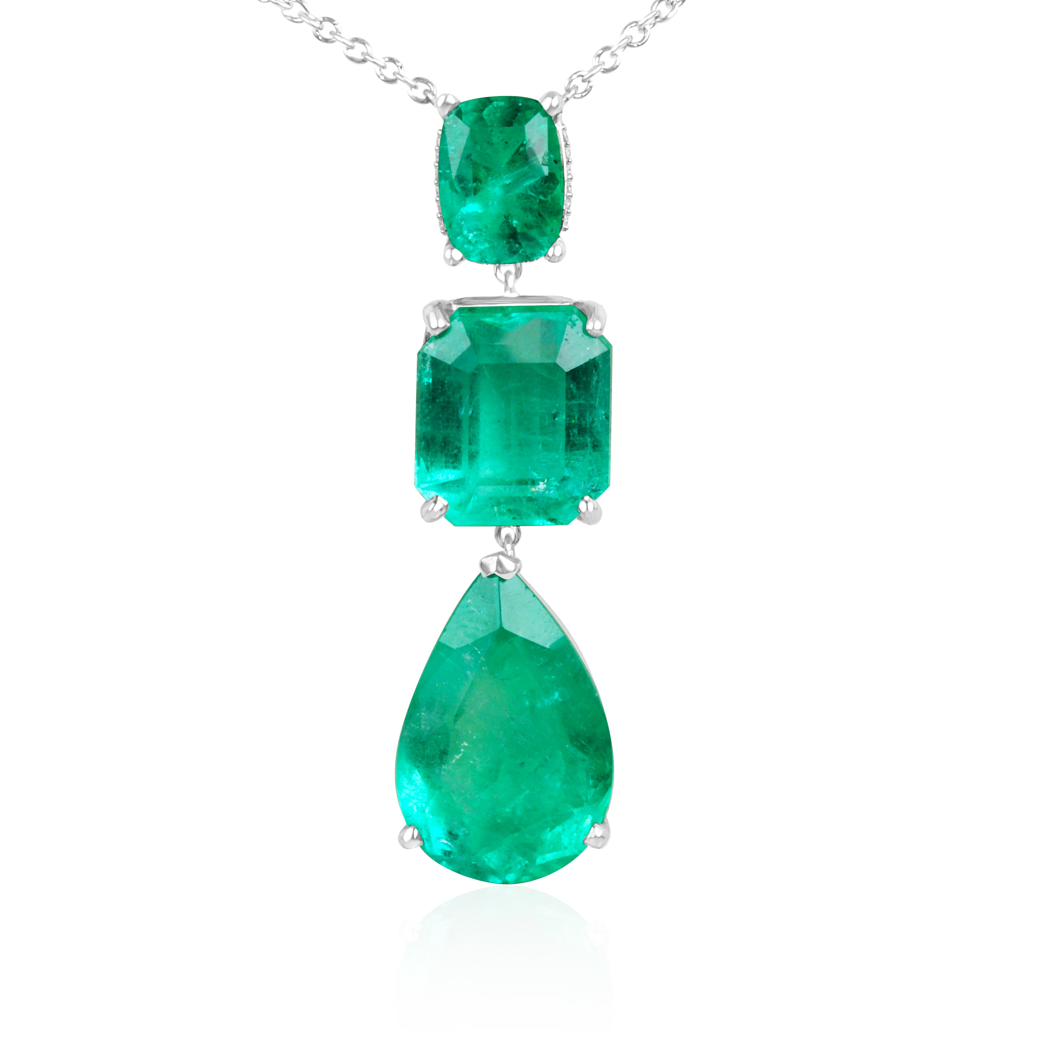 Colombian emerald and diamond by the yard necklace with cushion and pear drop emerald cuts in platinum, featuring 21.29tcw gemstones.