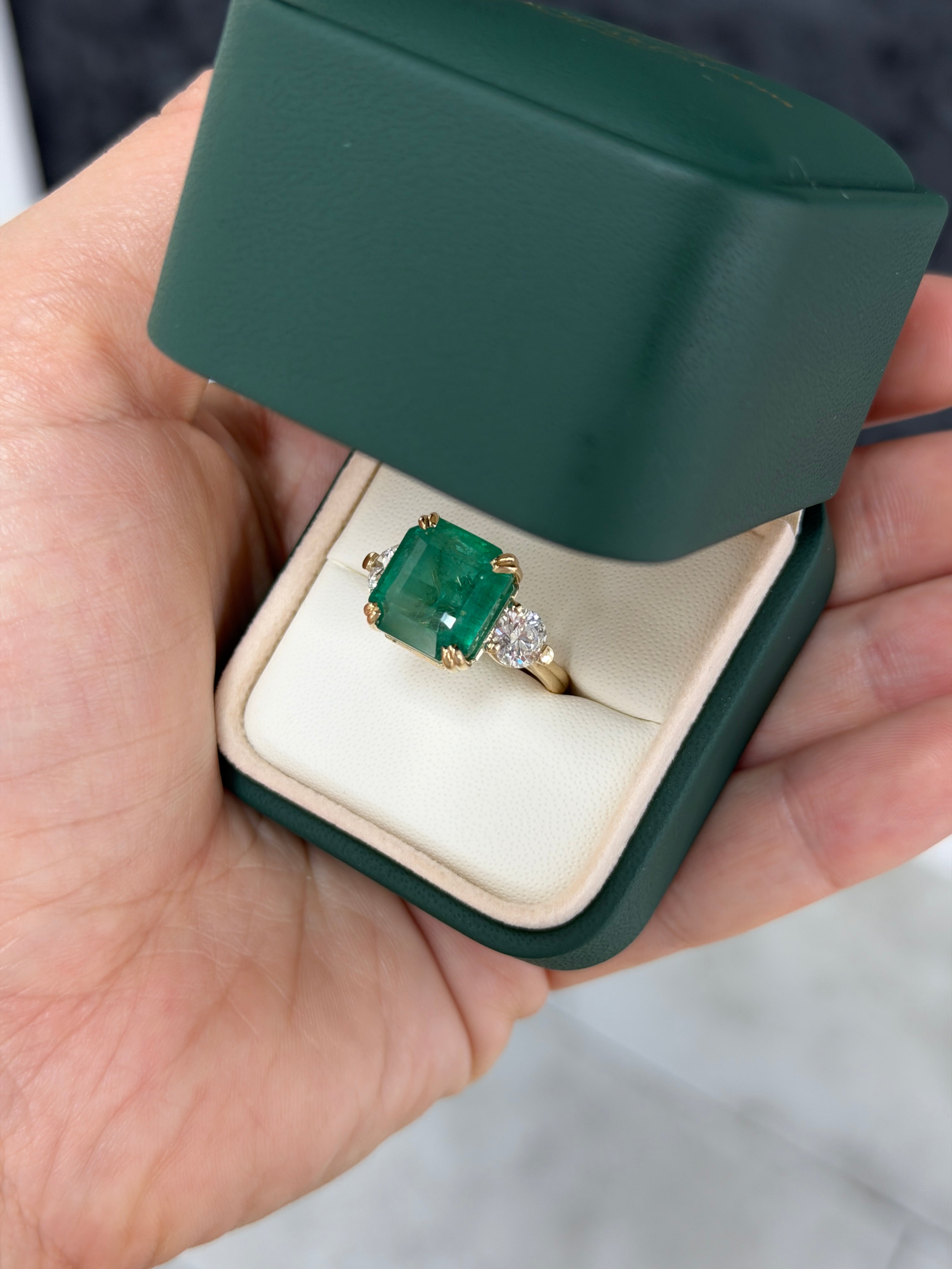 Three stone Asscher cut emerald engagement ring with lab diamonds in 14K gold cathedral setting by JR Colombian Emeralds.