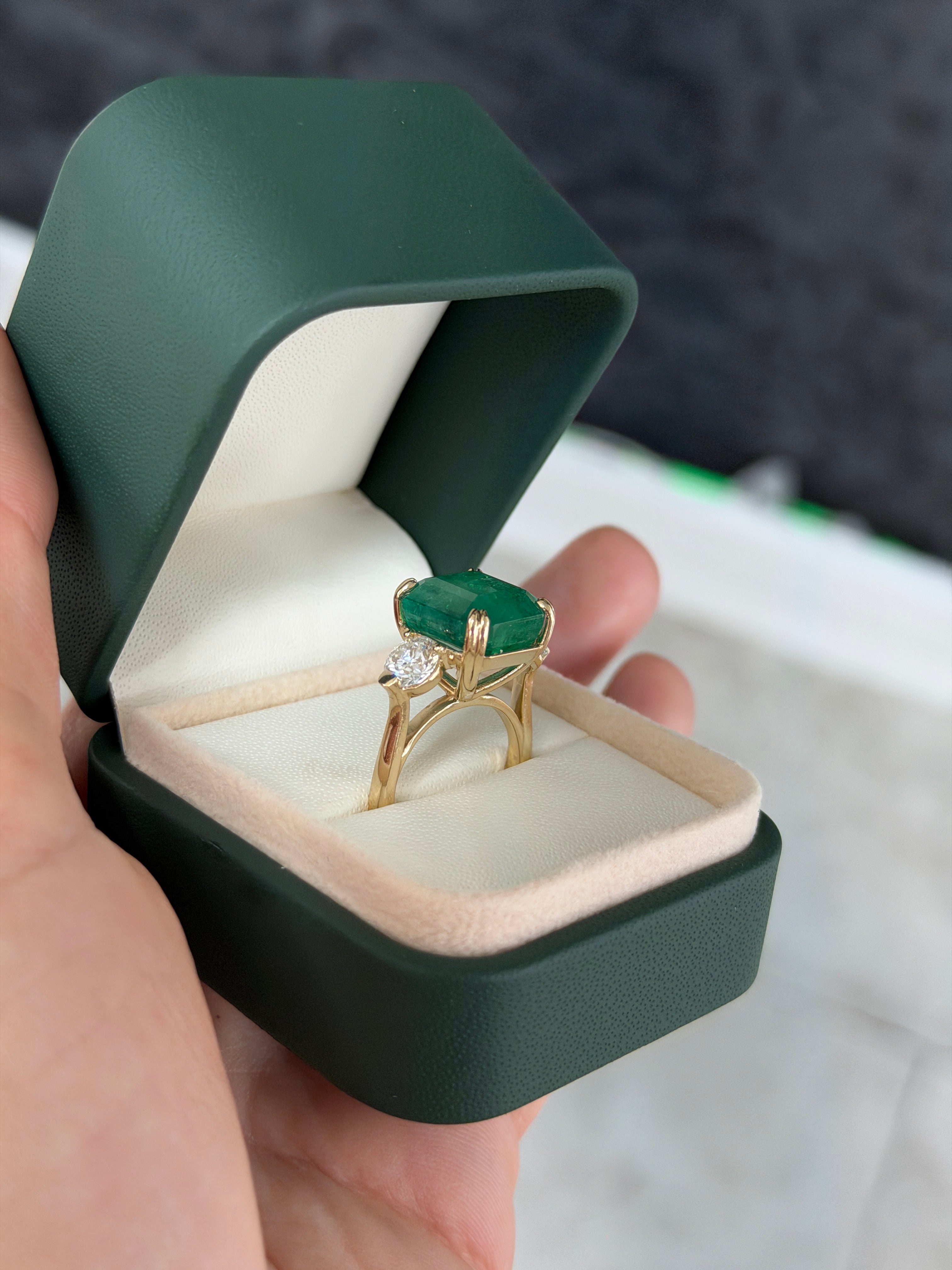 Three stone Asscher cut emerald engagement ring with round lab diamonds in 14K gold cathedral setting by JR Colombian Emeralds
