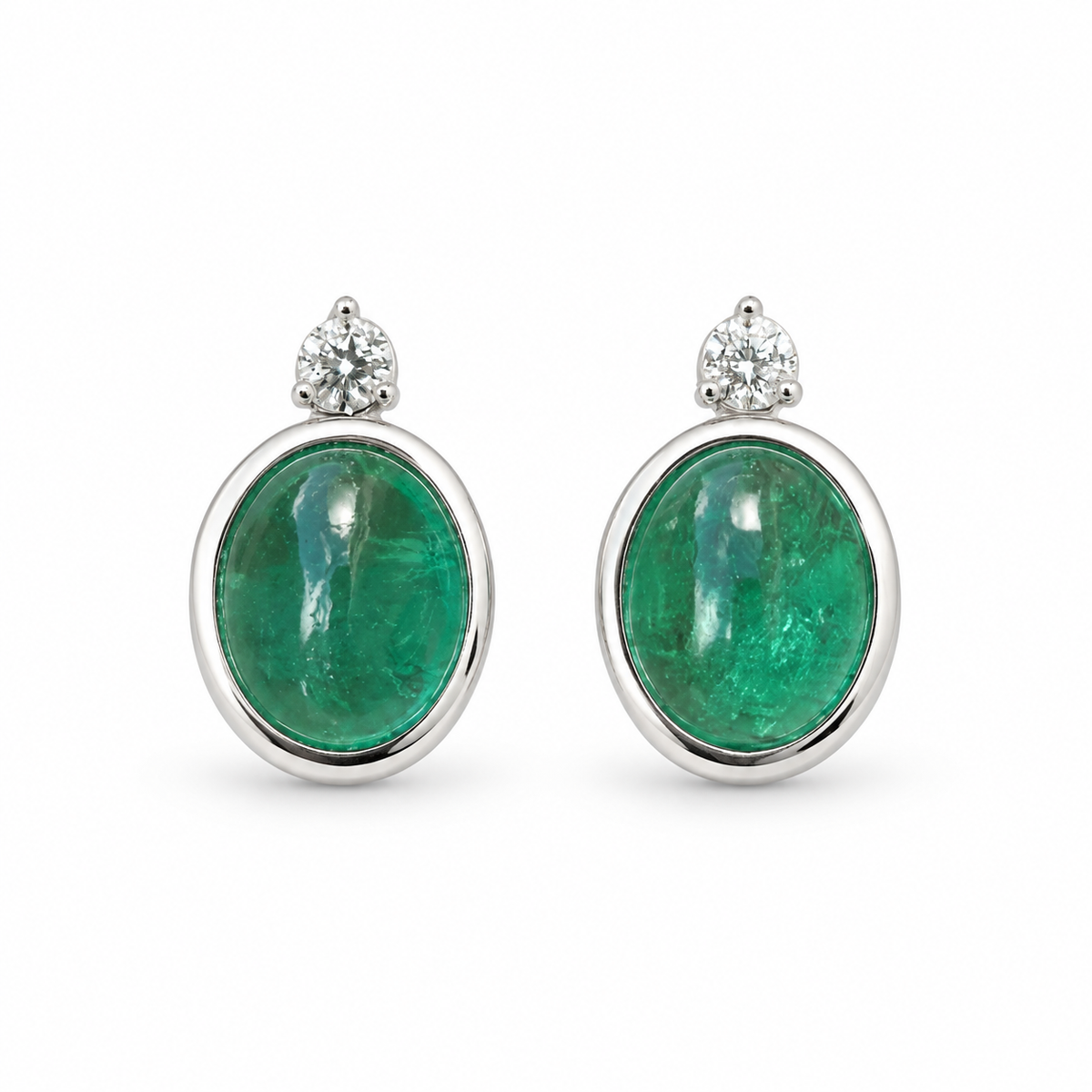 Oval green cabochon diamond accent earrings in 14K white gold with bezel setting, by JR Colombian Emeralds.