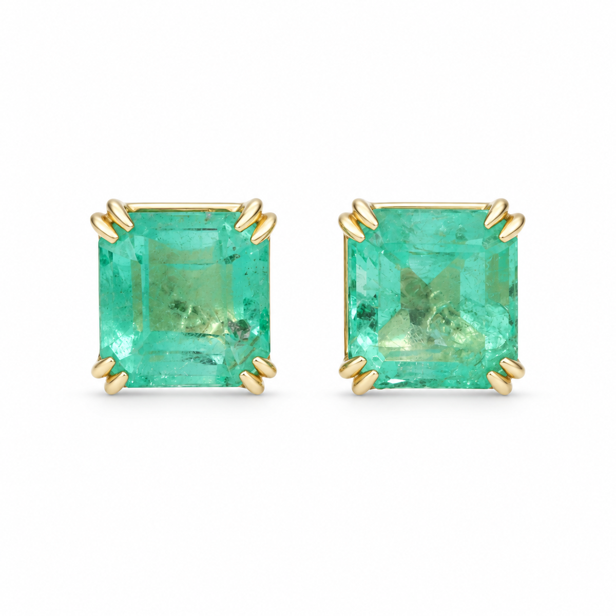 Pale aqua emerald stud earrings with 1.0 tcw double claw prong setting in 14K gold by JR Colombian Emeralds