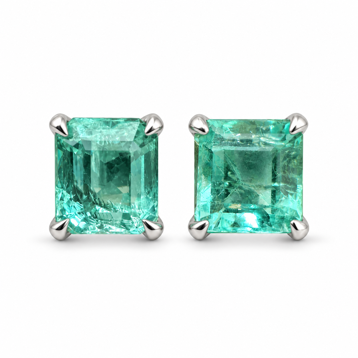 Pale aqua emerald stud earrings with Asscher cut, 1.0 carat total weight, set in 14K gold from JR Colombian Emeralds.