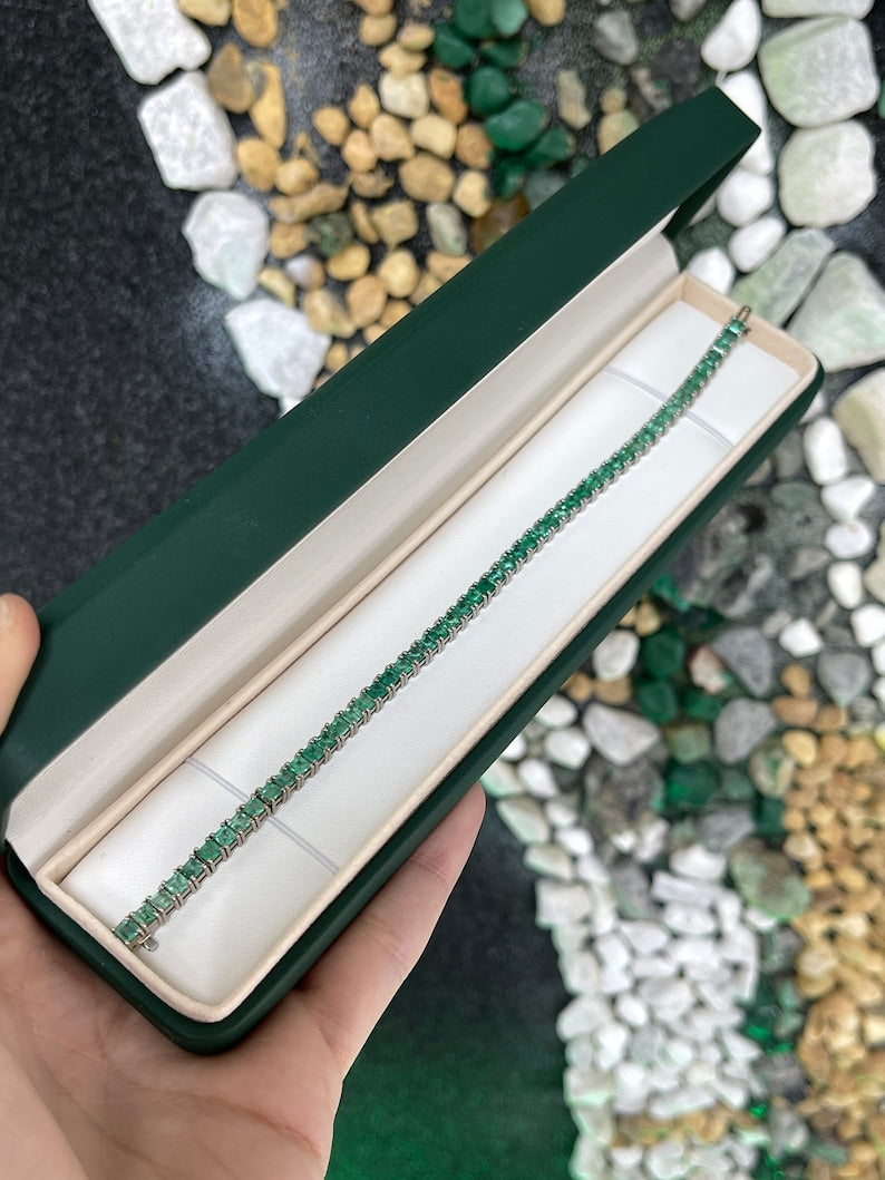 Unisex white gold tennis bracelet with medium green square princess cut emeralds, 7.0 tcw, from Colombian Emerald.