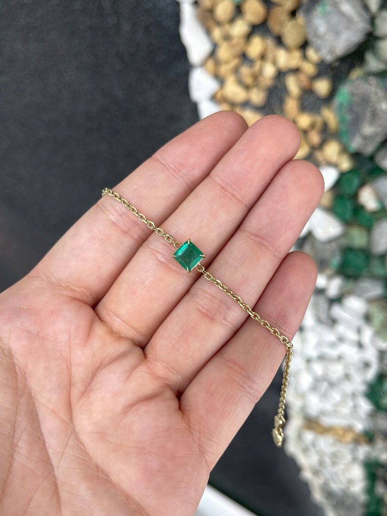 14K gold bracelet featuring a 1.70ct dark green emerald Asscher cut diamond chain from Colombian Emerald.