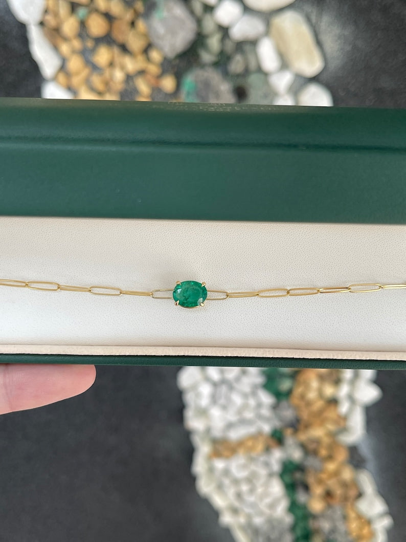 Colombian Emerald bracelet with 2.10ct oval cut green emerald, 14K gold, paperclip style, medium dark green, 4-prong east-west setting
