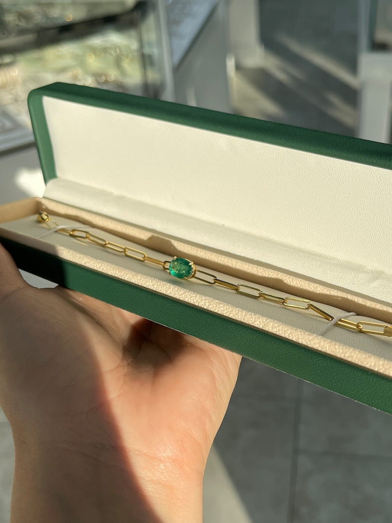 Colombian Emerald bracelet with 2.65ct oval cut natural emerald, 14K gold, paperclip design, medium dark green, 4-claw prong.