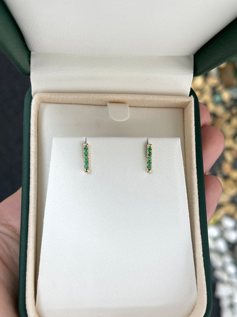 Colombian Emerald 14K yellow gold stacking earlobe bar earrings with vivid green natural emeralds, 0.20 carats, French set design.