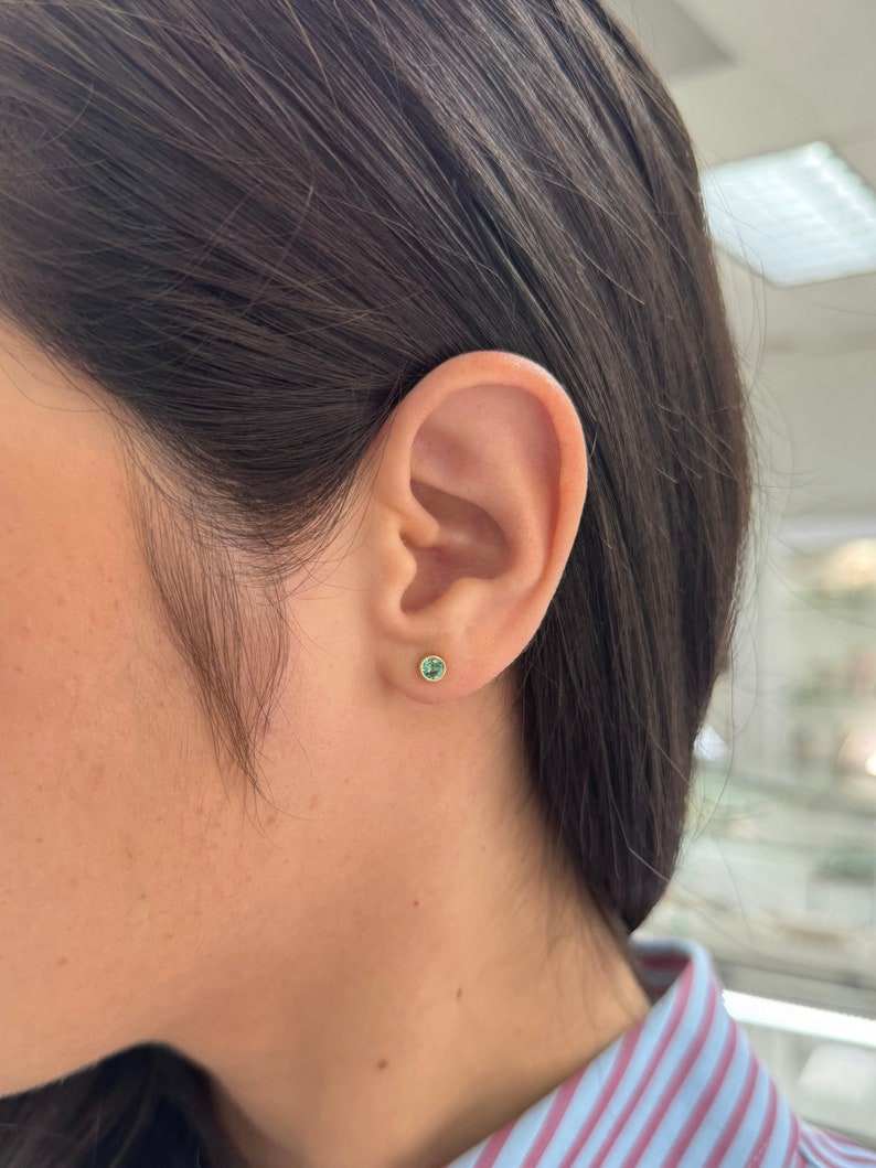 Colombian Emerald 14K yellow gold earrings with 0.50tcw natural lush medium green round-cut bezel-set gemstones