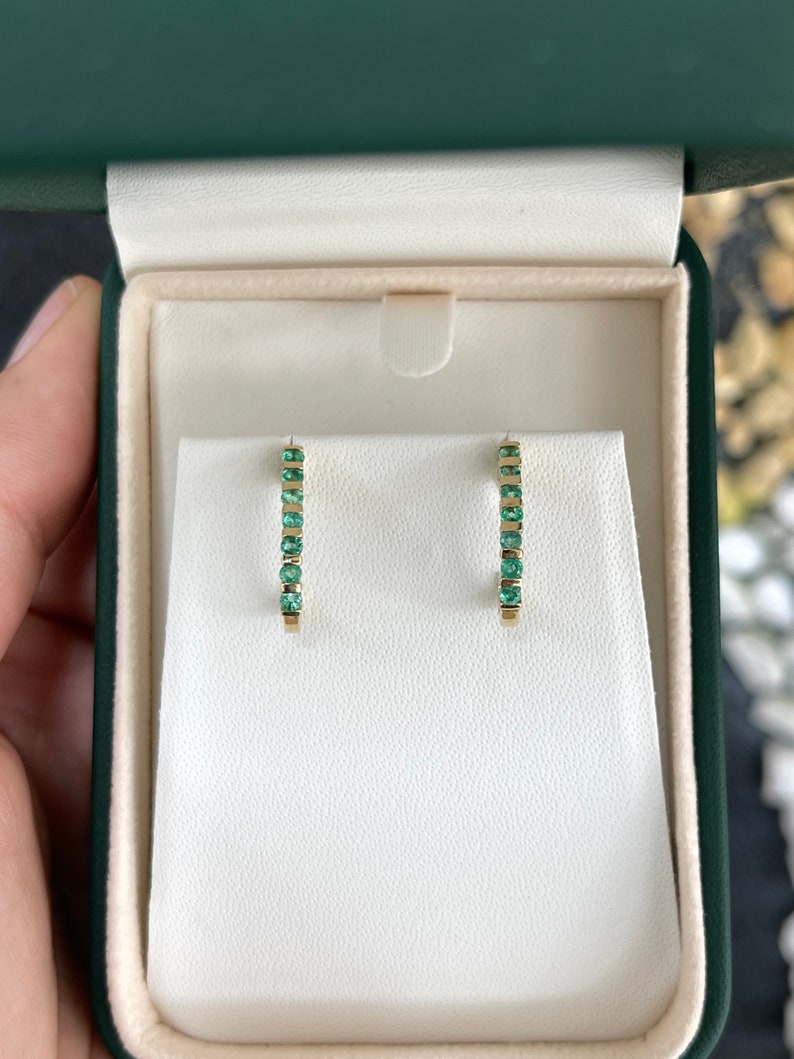 Natural round emerald half J-hoop earrings in 14K yellow gold with 0.75tcw from Colombian Emerald.