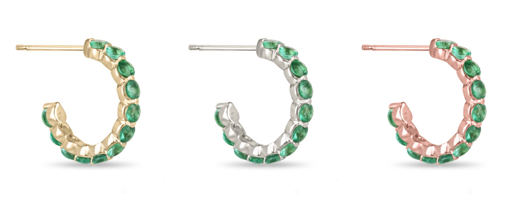 Colombian Emerald 14K yellow gold huggie earrings with round cut green emeralds, prong set, in a half hoop design.