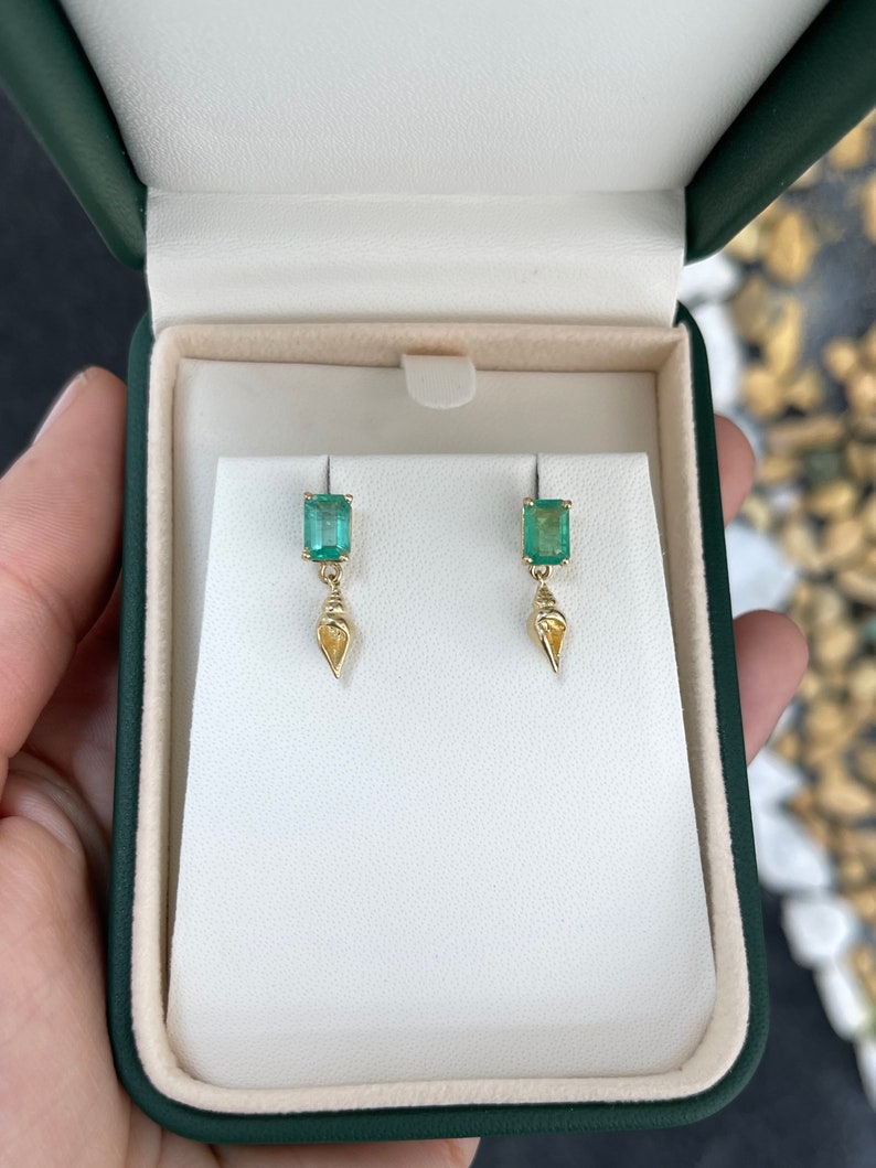 Colombian Emerald 14K gold dangle earrings with natural emerald and sea shell accents, 1.80tcw gemstone weight.