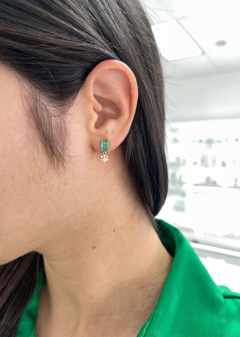 Colombian Emerald 14K gold dog paw print stud earrings with 2.36tcw emerald and diamond accents, close-up view