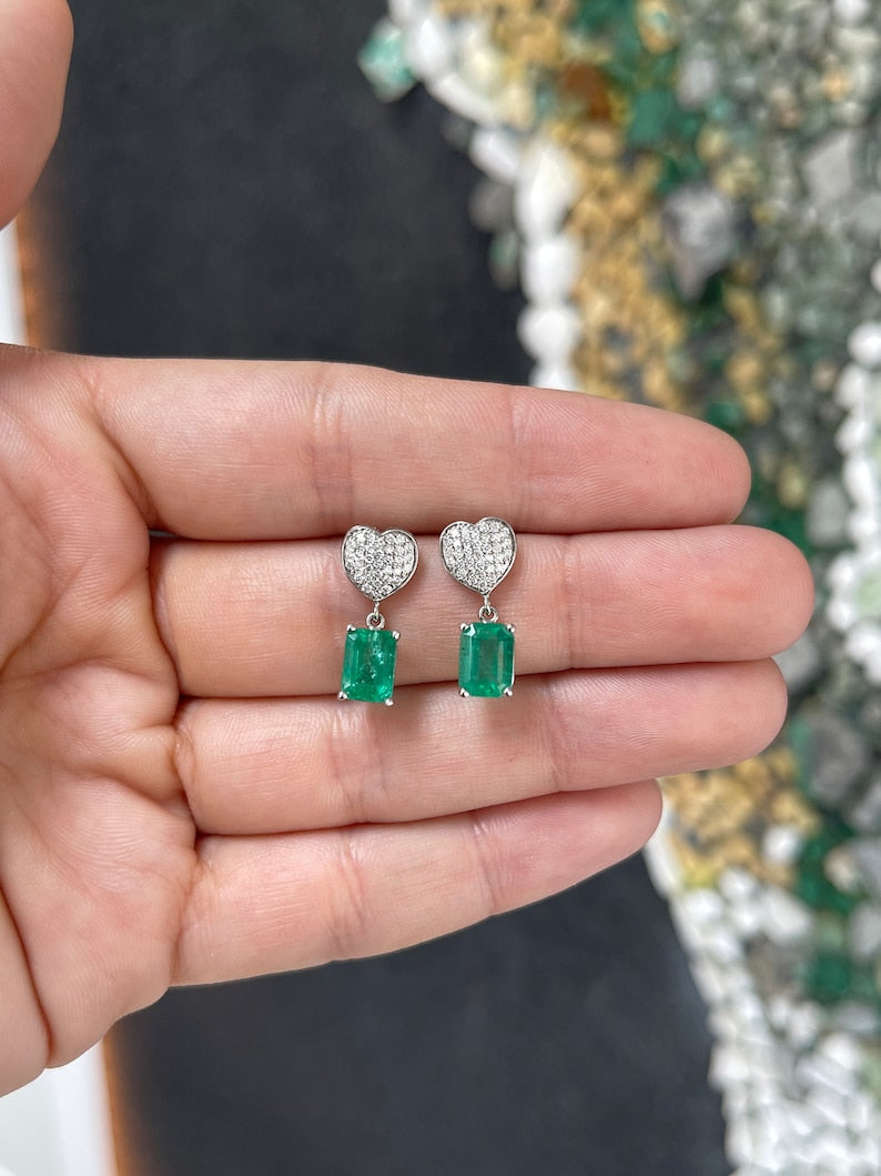 Colombian Emerald 14K gold dangle earrings with 3.20tcw medium green emeralds and diamond heart cluster design