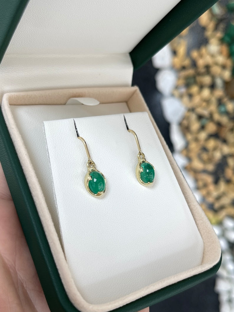 Colombian Emerald earrings with 3.60tcw oval cabochon cut emeralds on 14K gold ear wire dangles, natural and elegant jewelry.