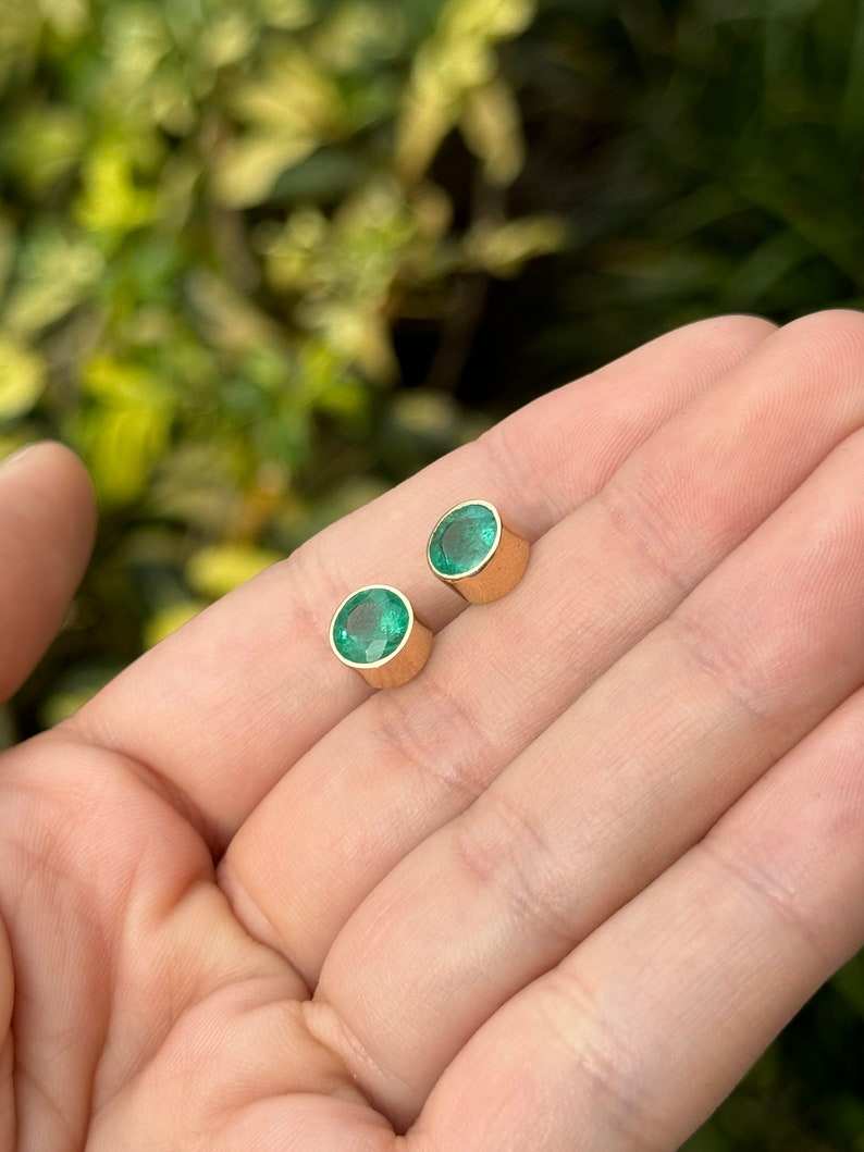 Natural lush green 14K unisex emerald stud earrings with 7mm round cut Colombian emeralds, 2.82 tcw, in a secure setting